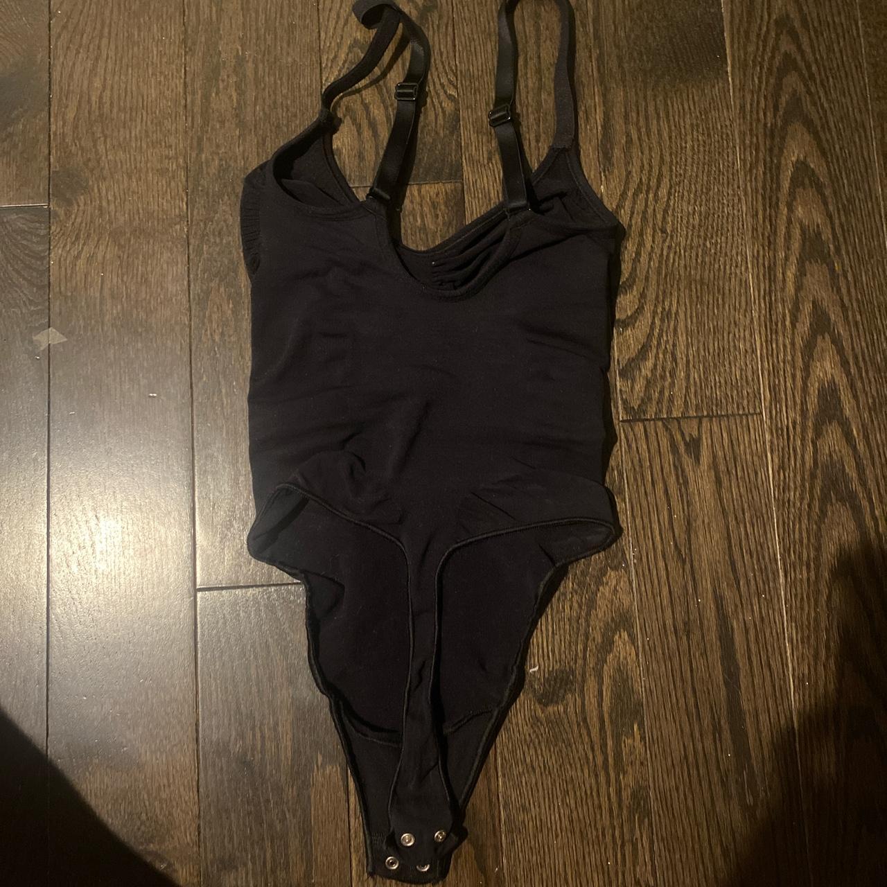 skims thong bodysuit in color black/onyx , only work