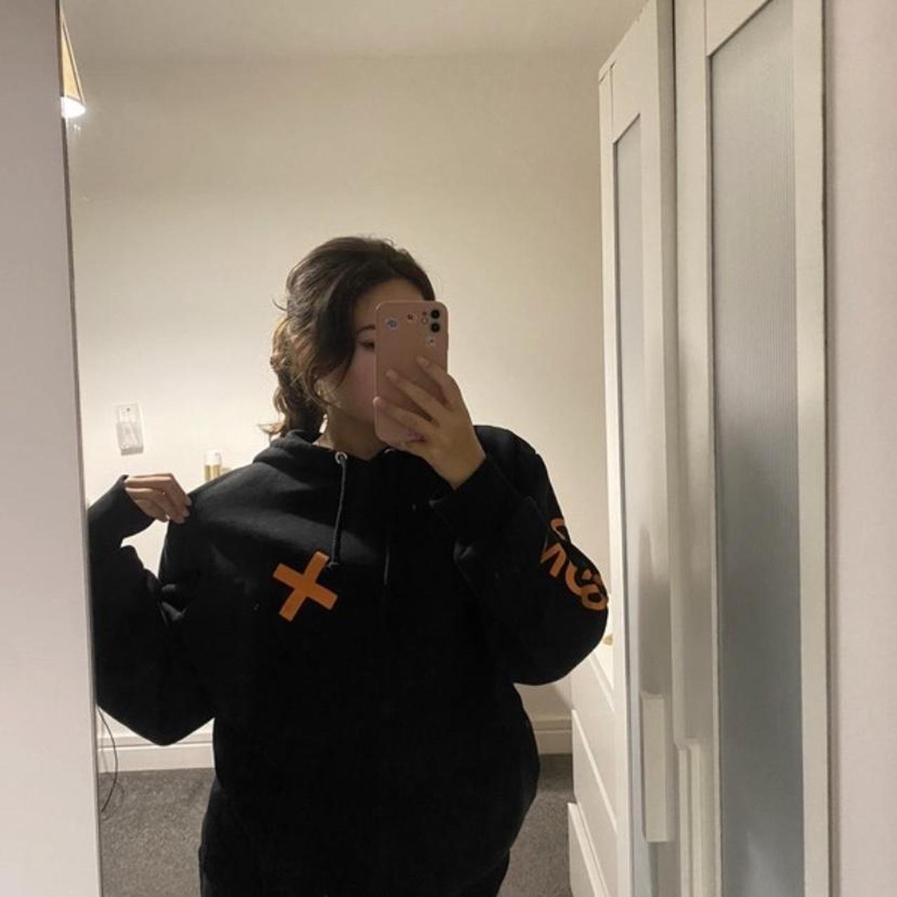 Black with orange writing collusion hoodie Depop