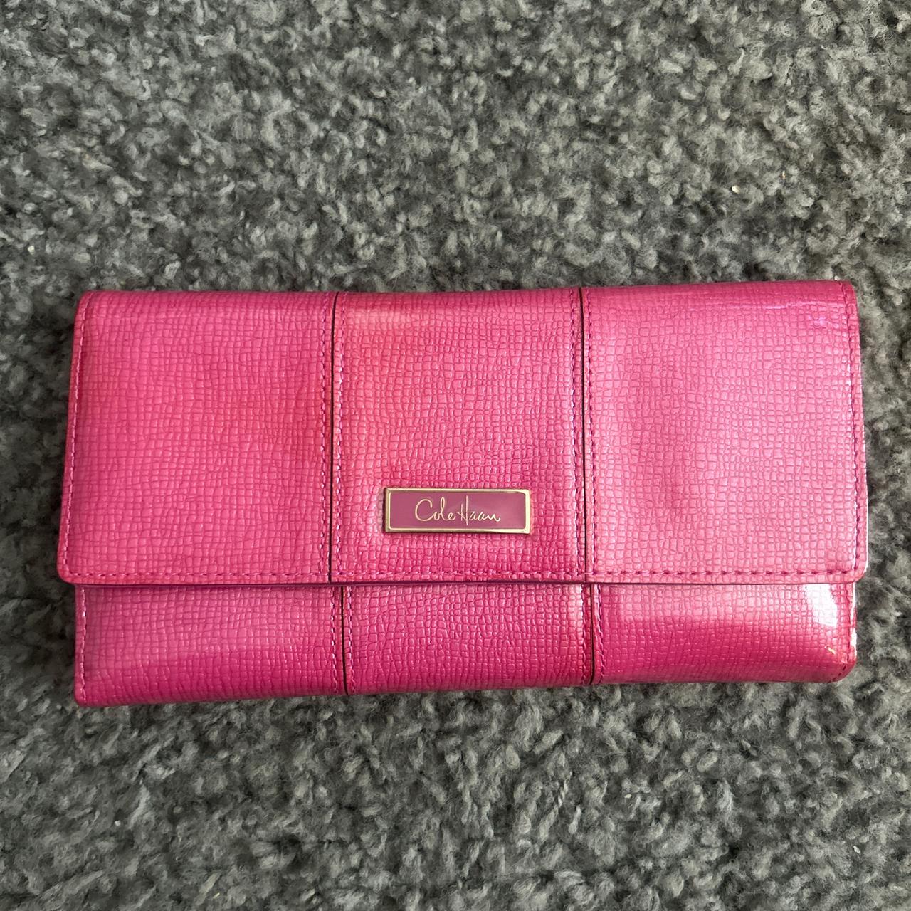 Pink Cole selling Haan clutch