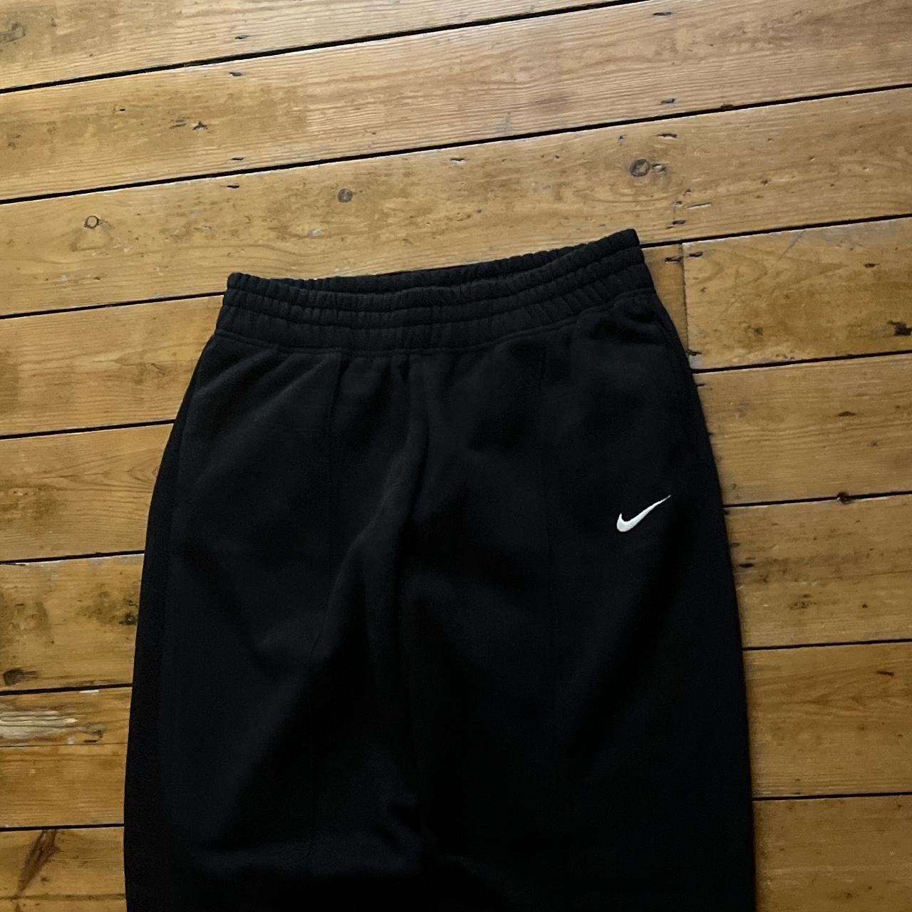 Super sick baggy Nike joggers in black with a white... - Depop