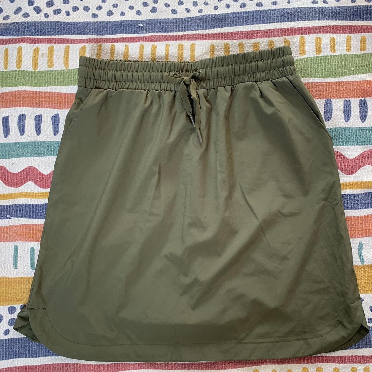 Dark green hiking skirt with elastic waistband. Depop
