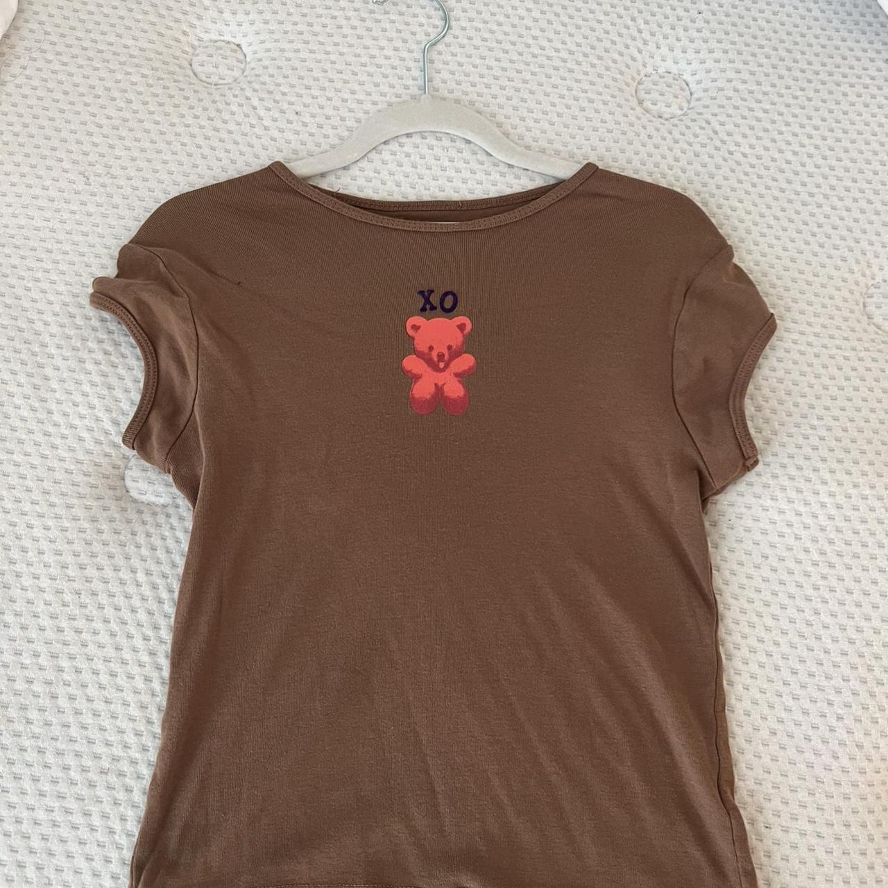 unif brown xo teddy bear baby tee. in great... Depop