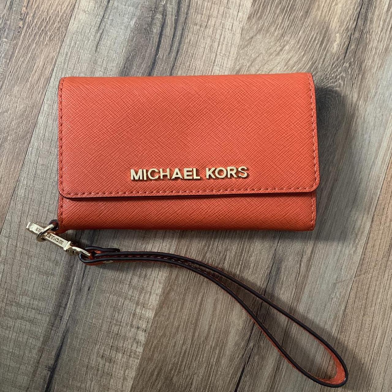 Red micheal kors wallet with wristlet with gold - Depop