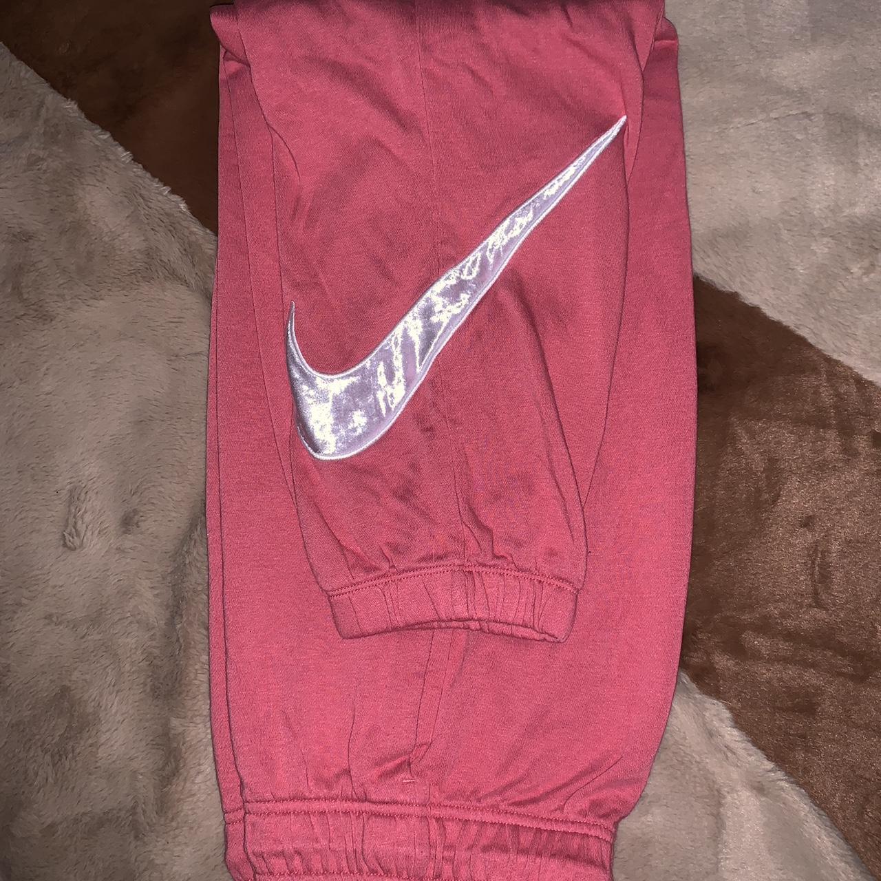 Hot pink nike sweatpants hot sale