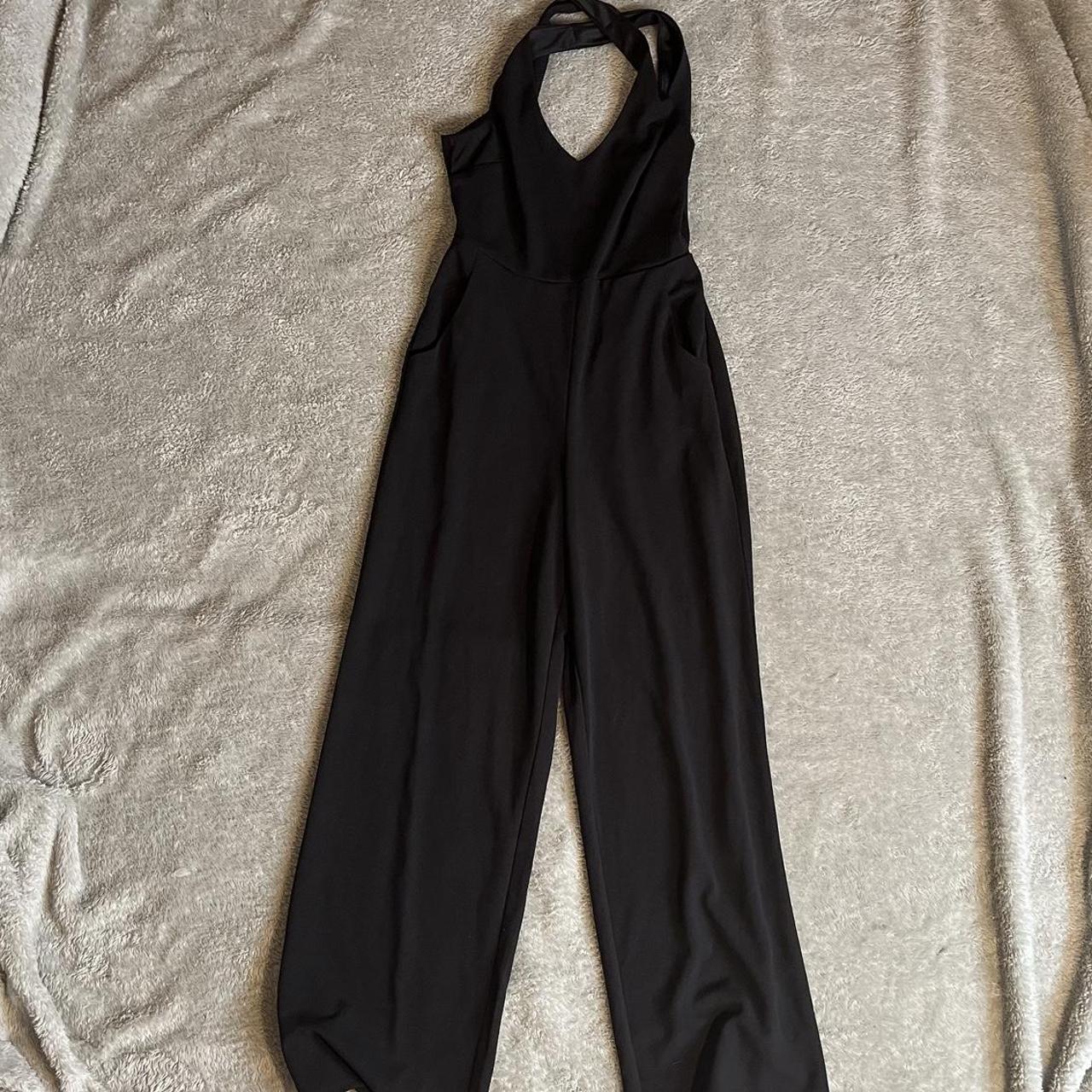 Black jumpsuit with zip up back Size M ⭐️US... - Depop