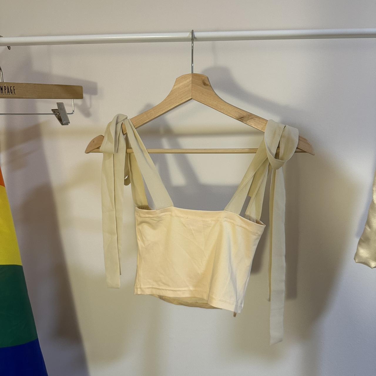 Verge Girl Italian style tie strap top in cream,... Depop