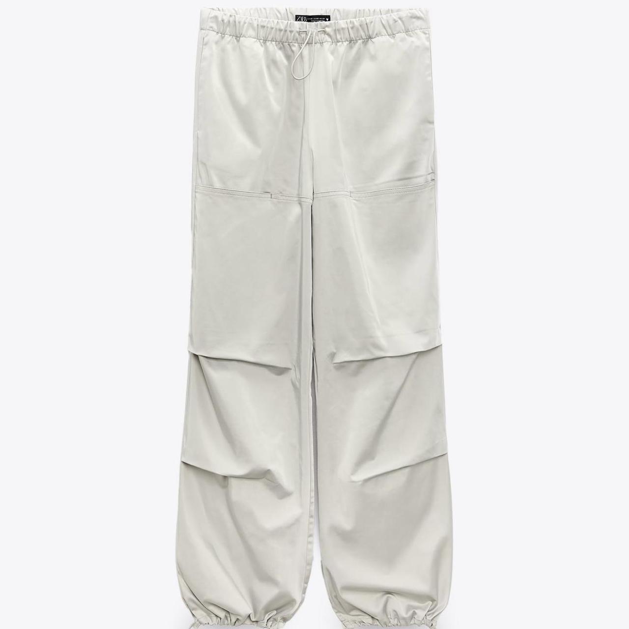 Satin effect parachute pants in pearl grey - Used | Depop