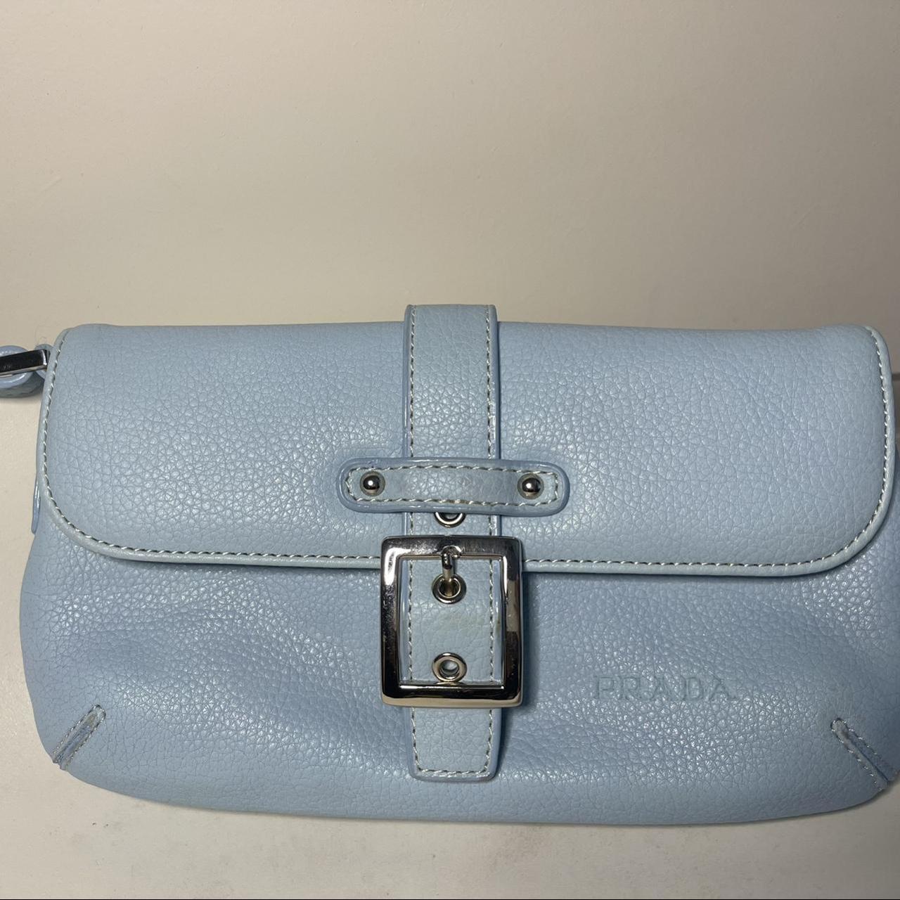 Faux Prada baby blue wristlet brand new and has... - Depop