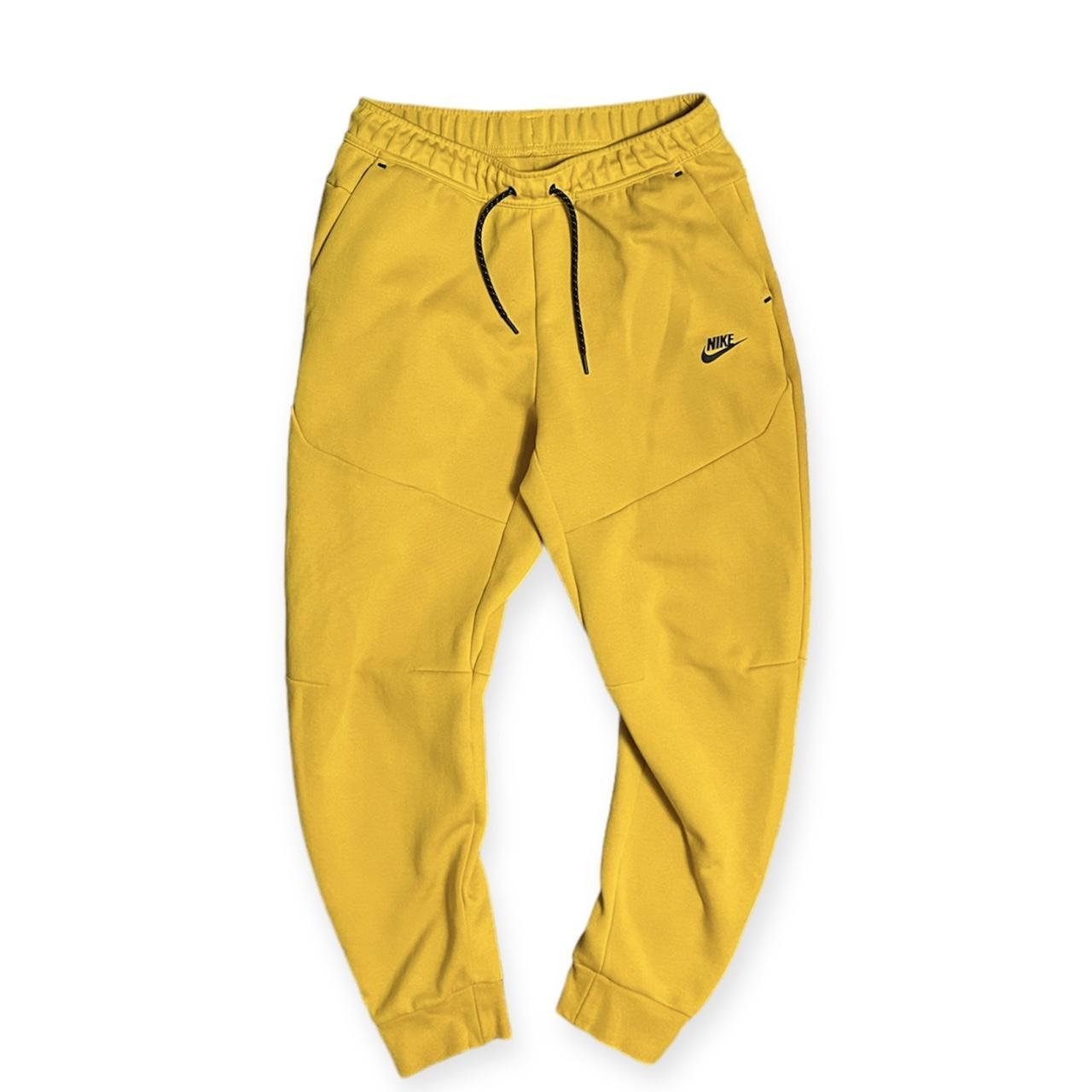 Yellow nike tech online pants