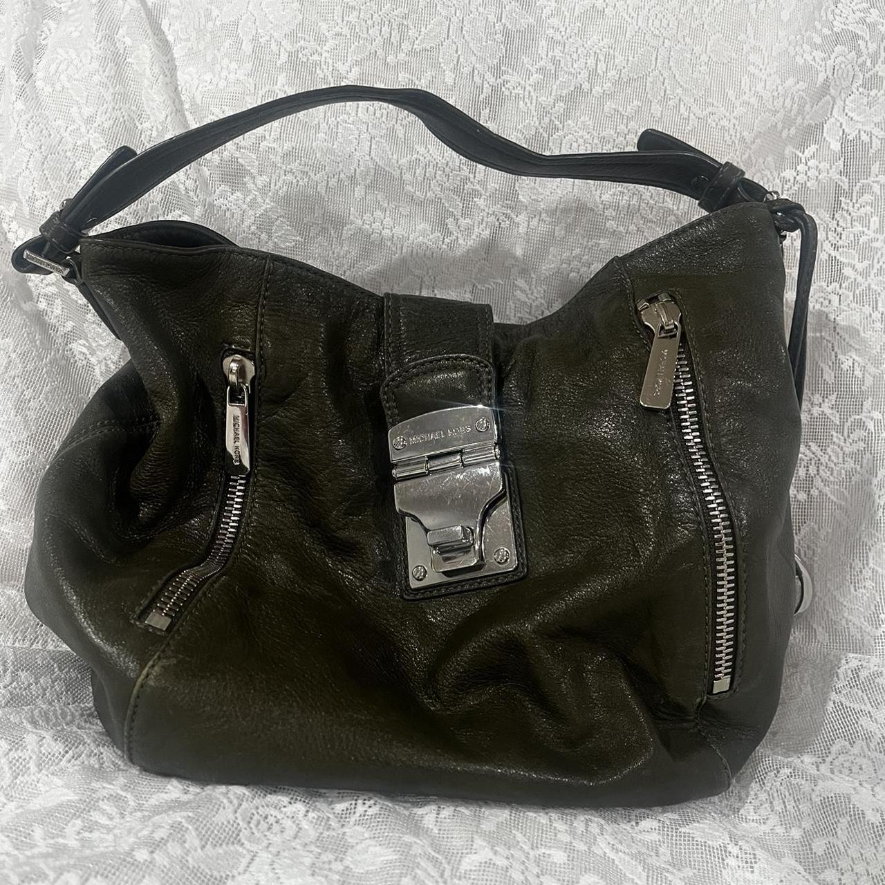 Damaged michael kors online bag