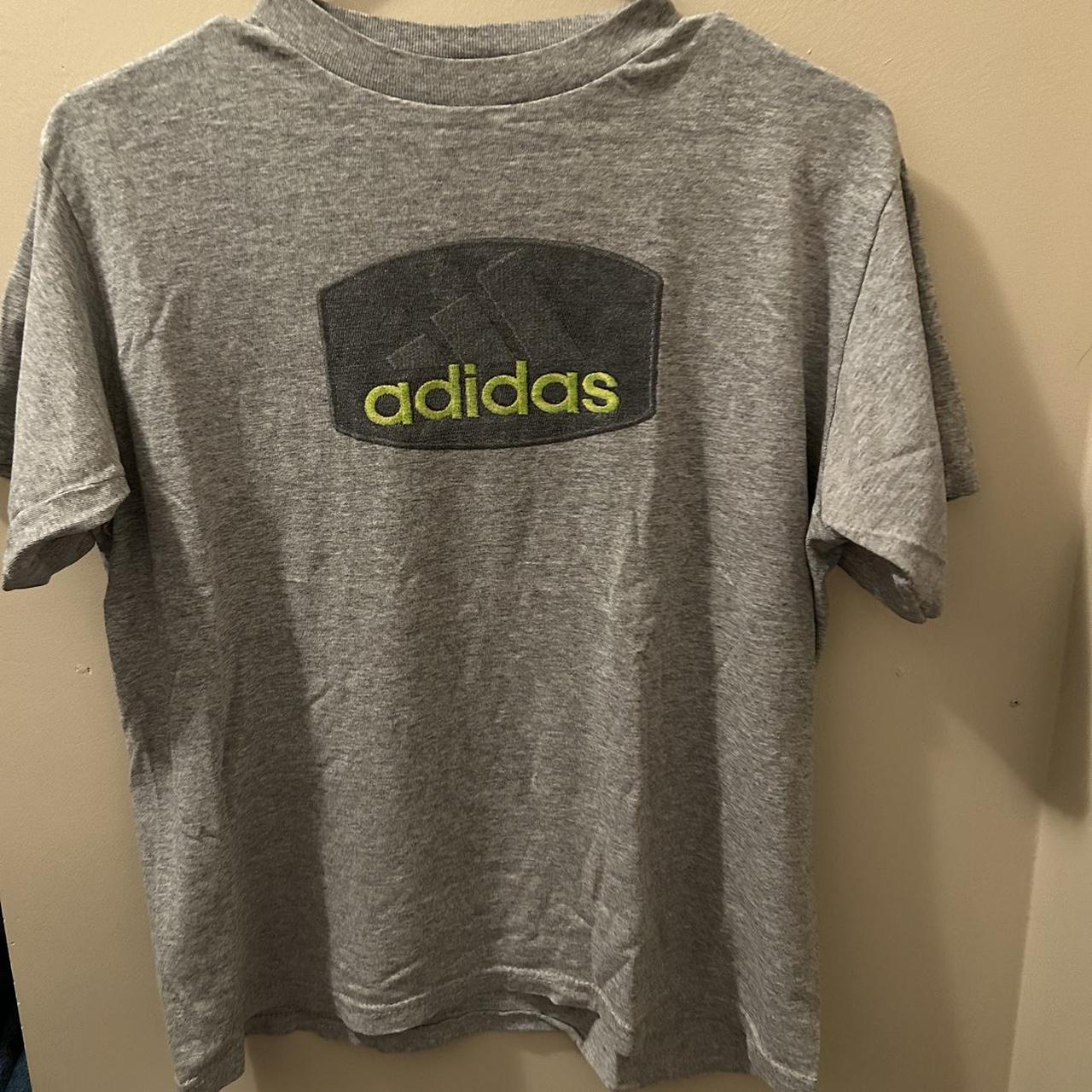 early 2000s adidas tee would fit best a small pit... - Depop