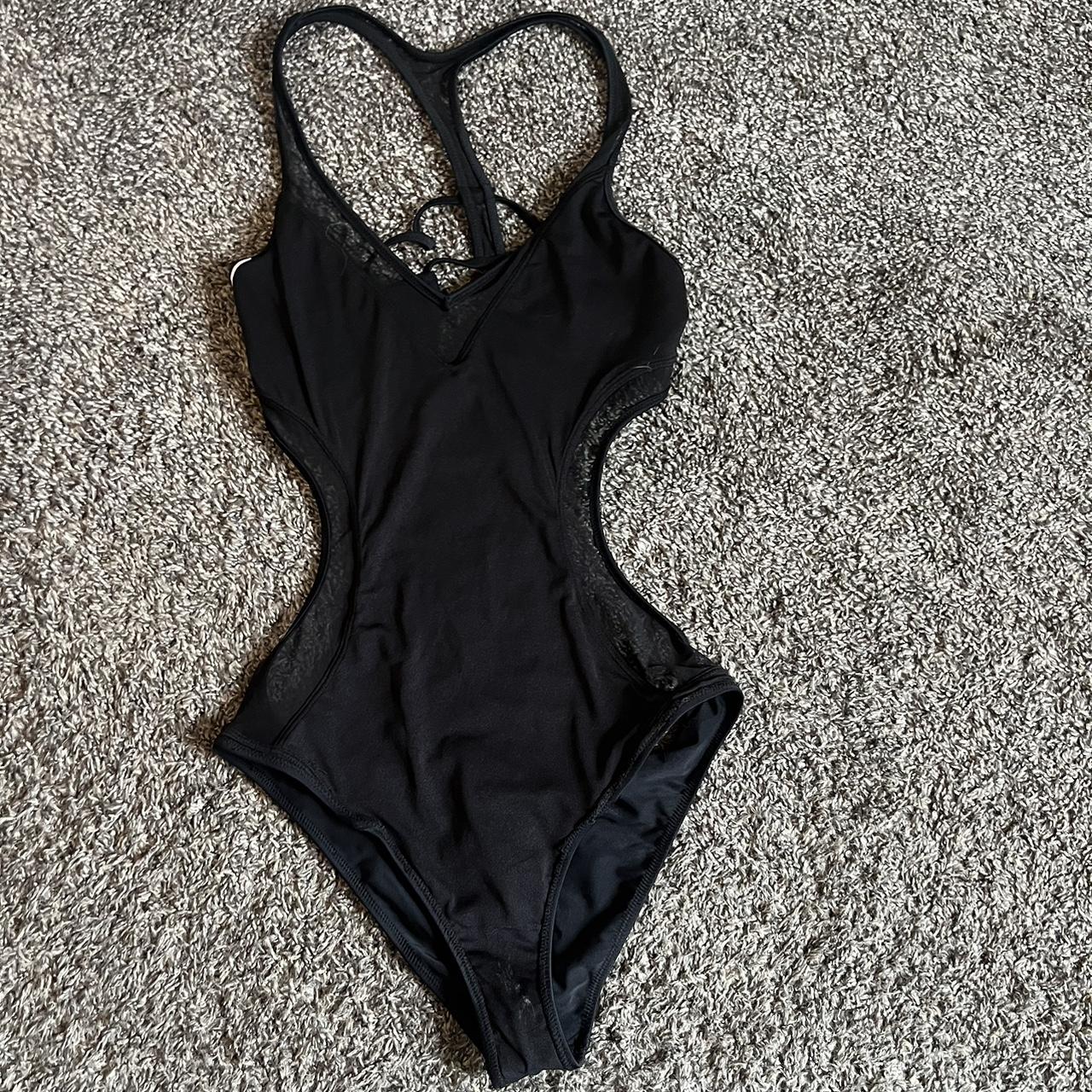 One piece bathing suit Open in the back Never worn - Depop