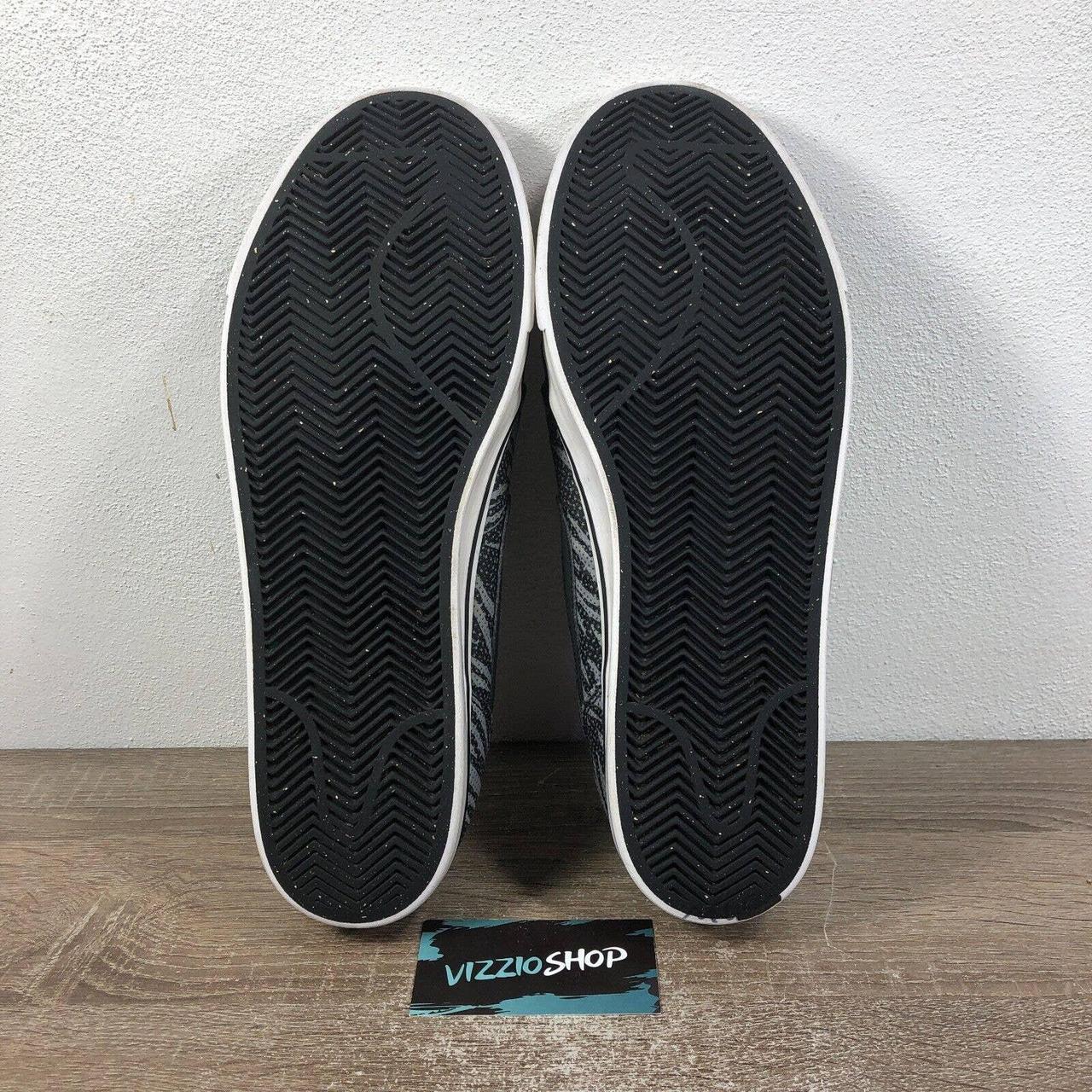 nike toki low all black