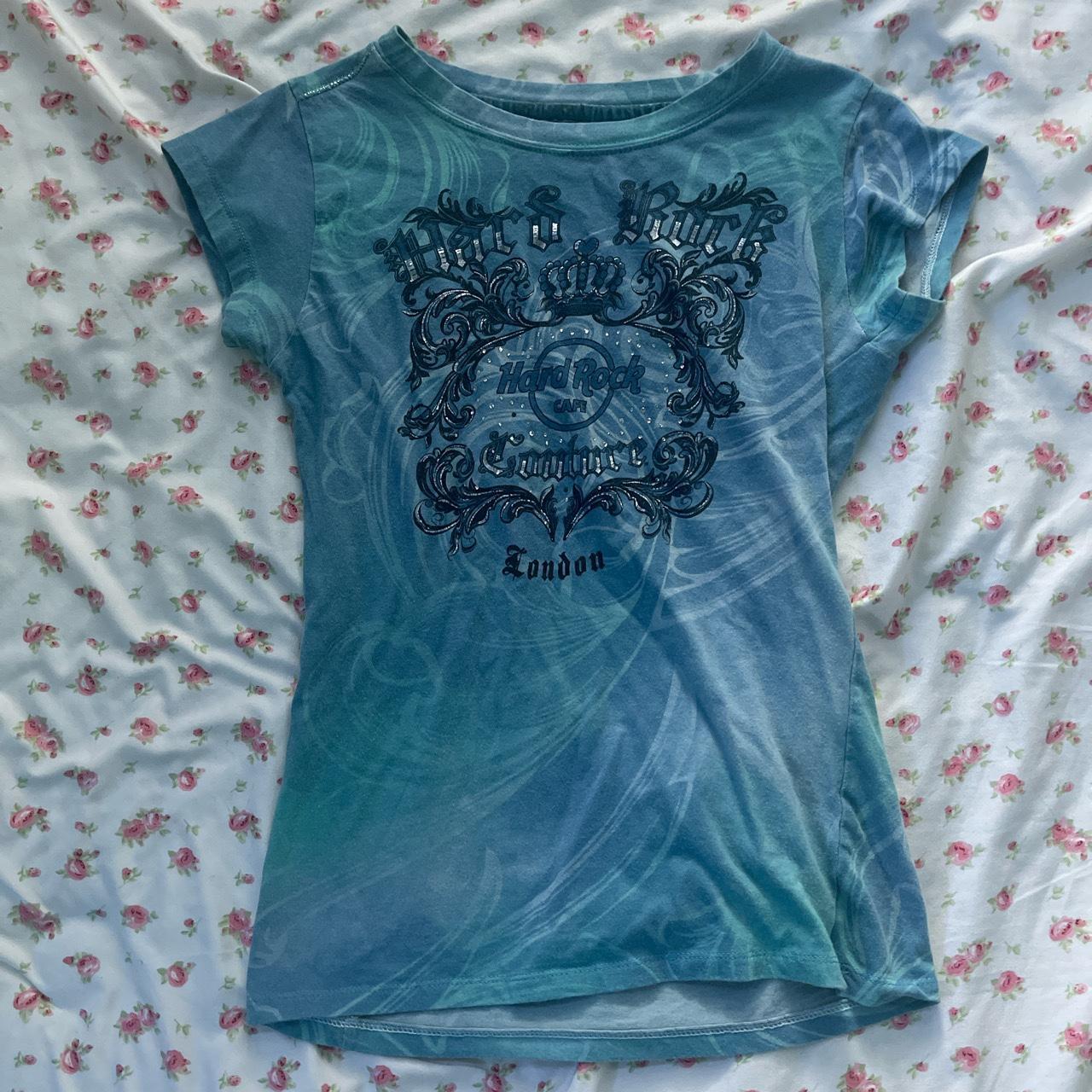 hard rock cafe shirt color is faded from wear in... - Depop