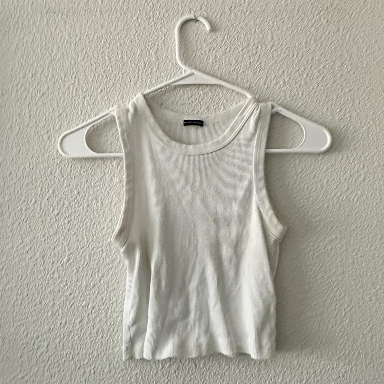 Brandy Melville white tank Has a little stain on the... Depop
