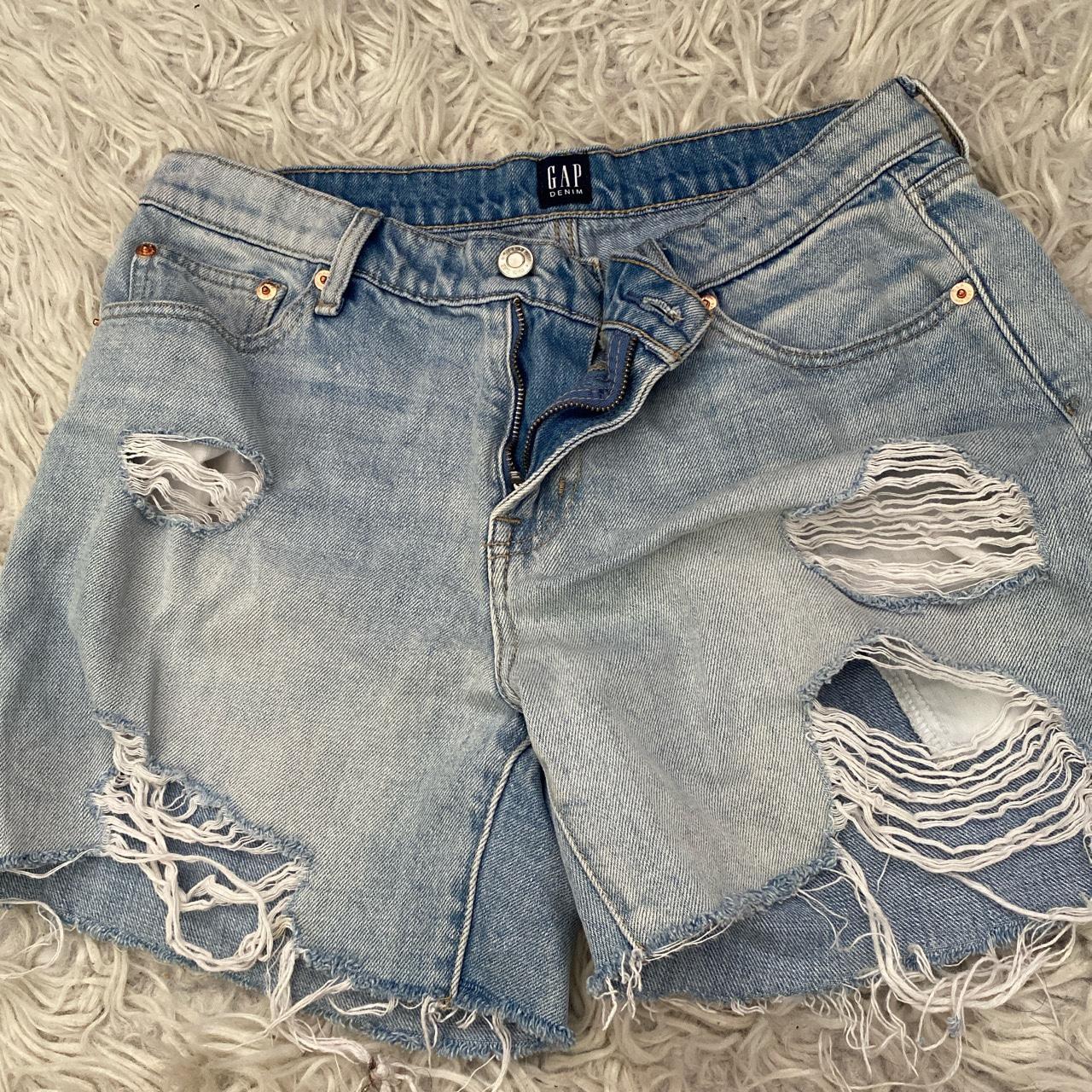 Light wash best sale ripped shorts