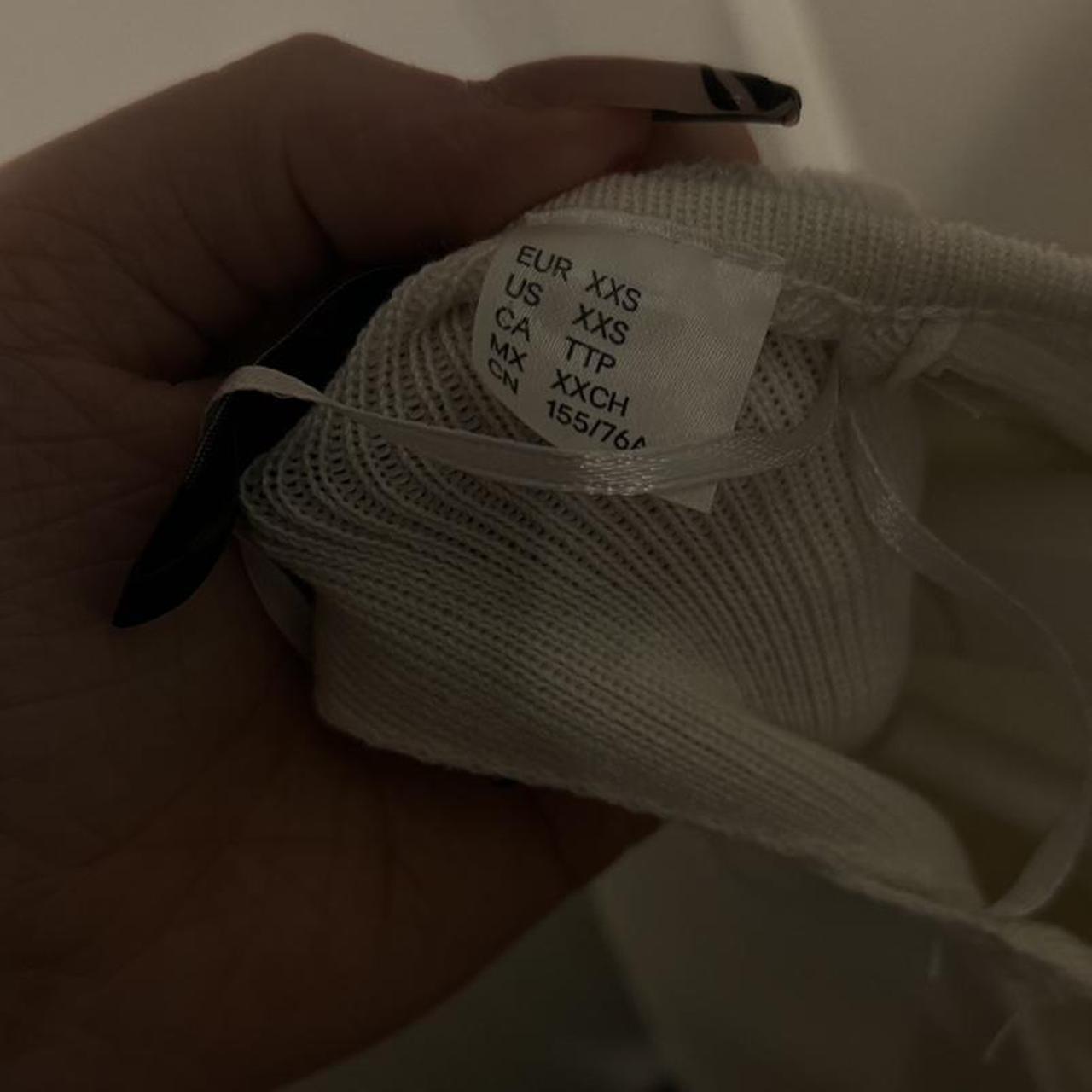 cream open back long sleeve would fit up to a size... - Depop