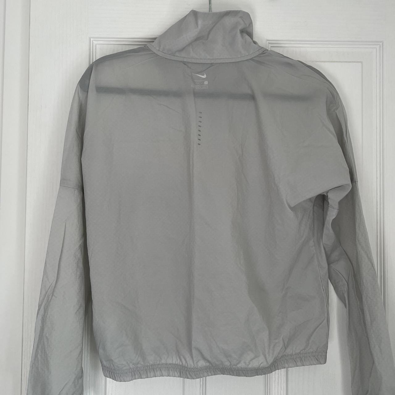 Grey Nike thin jacket. Size small Depop