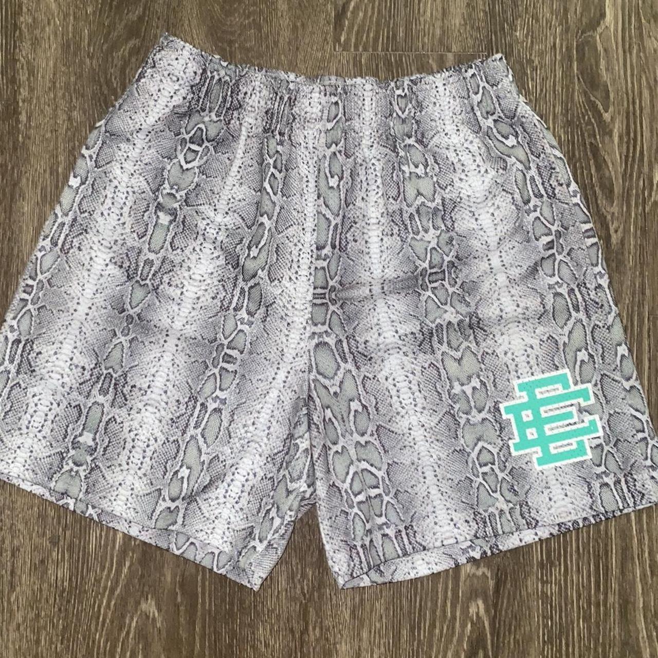 Eric Emanuel Snakeskin with Teal logo basketball | Depop