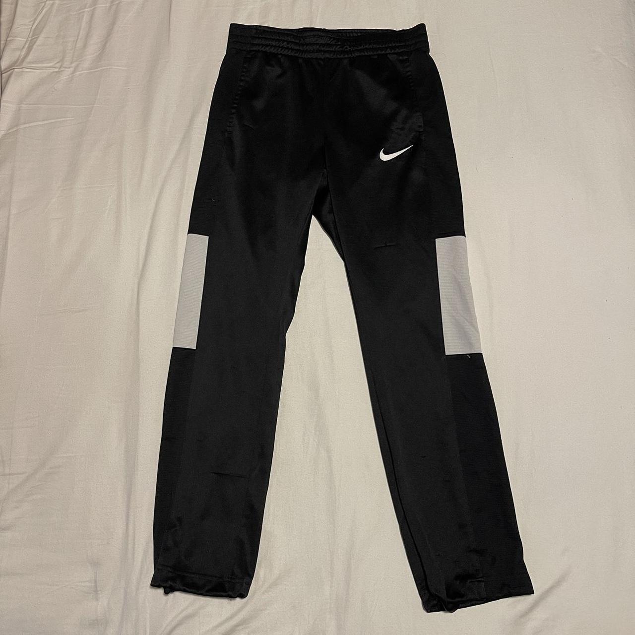 Black and white Nike sweatpants Size small Length:... - Depop