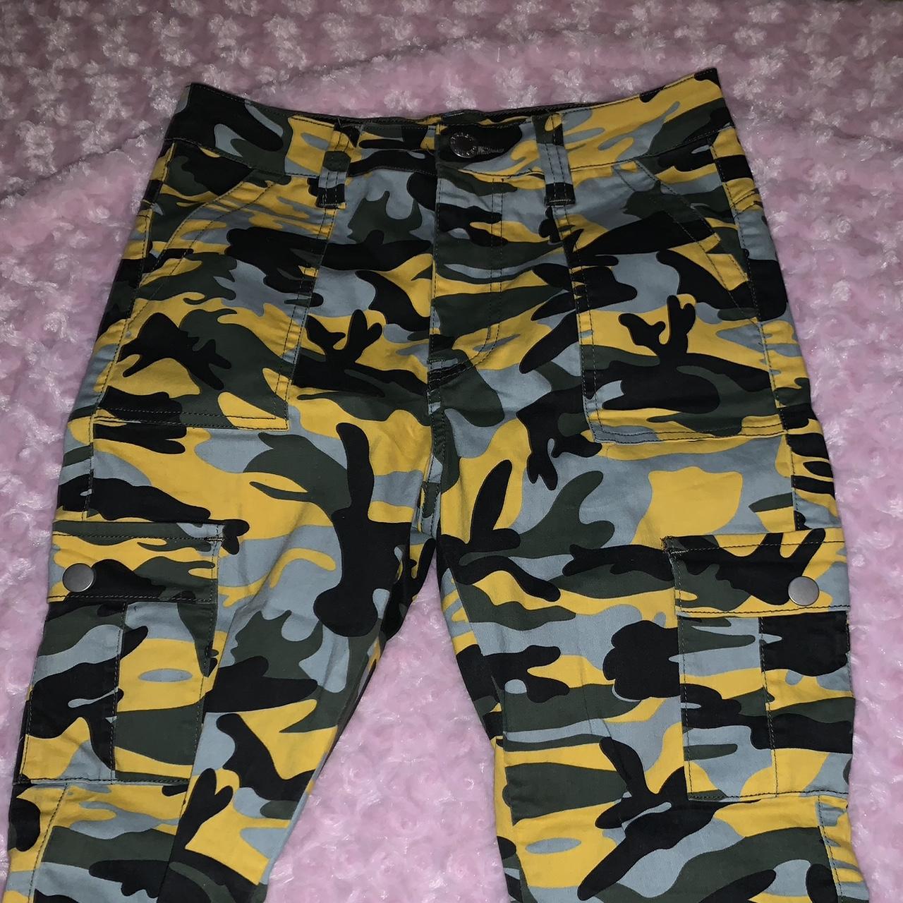 Yellow shops and green camo pants