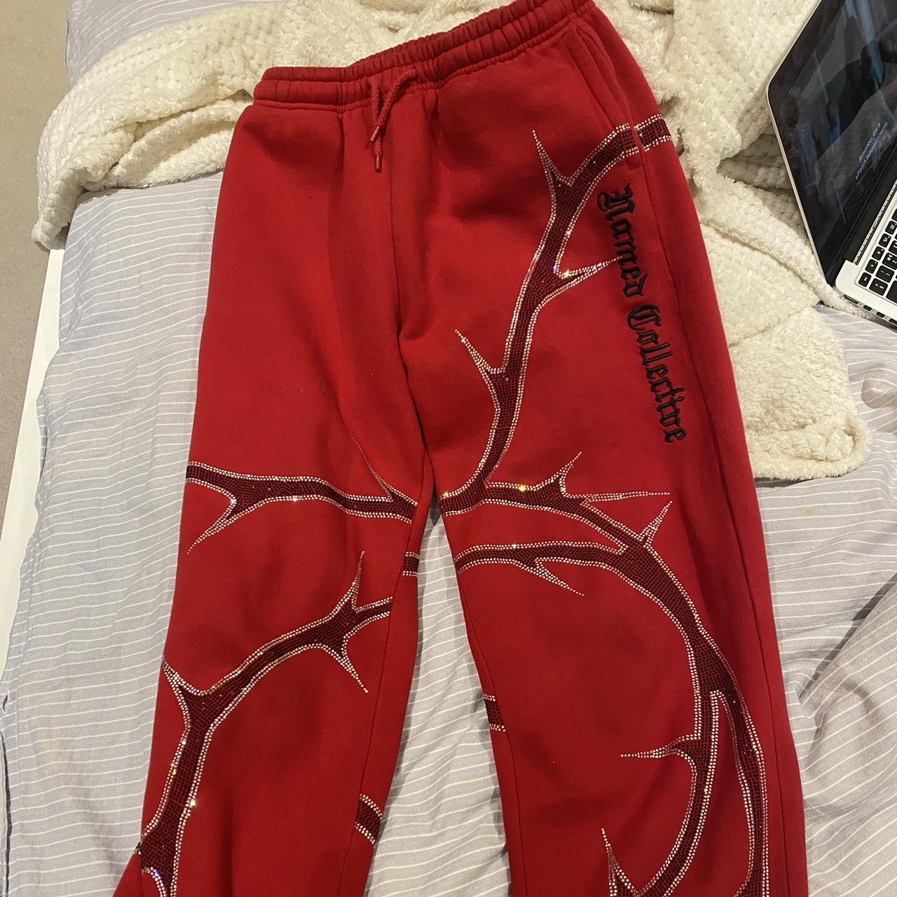 Red named collective Thorn Rhinestone joggers ‼️ Size