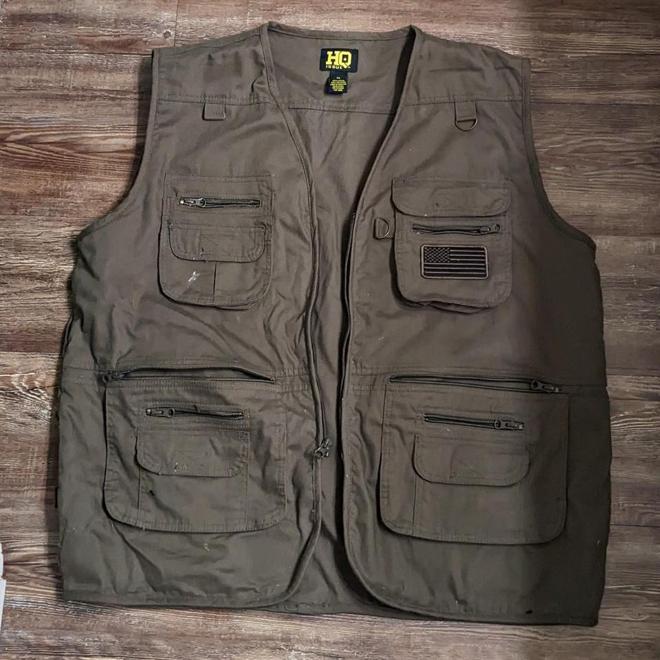 Brown tactical fishing vest with a bunch of pockets.