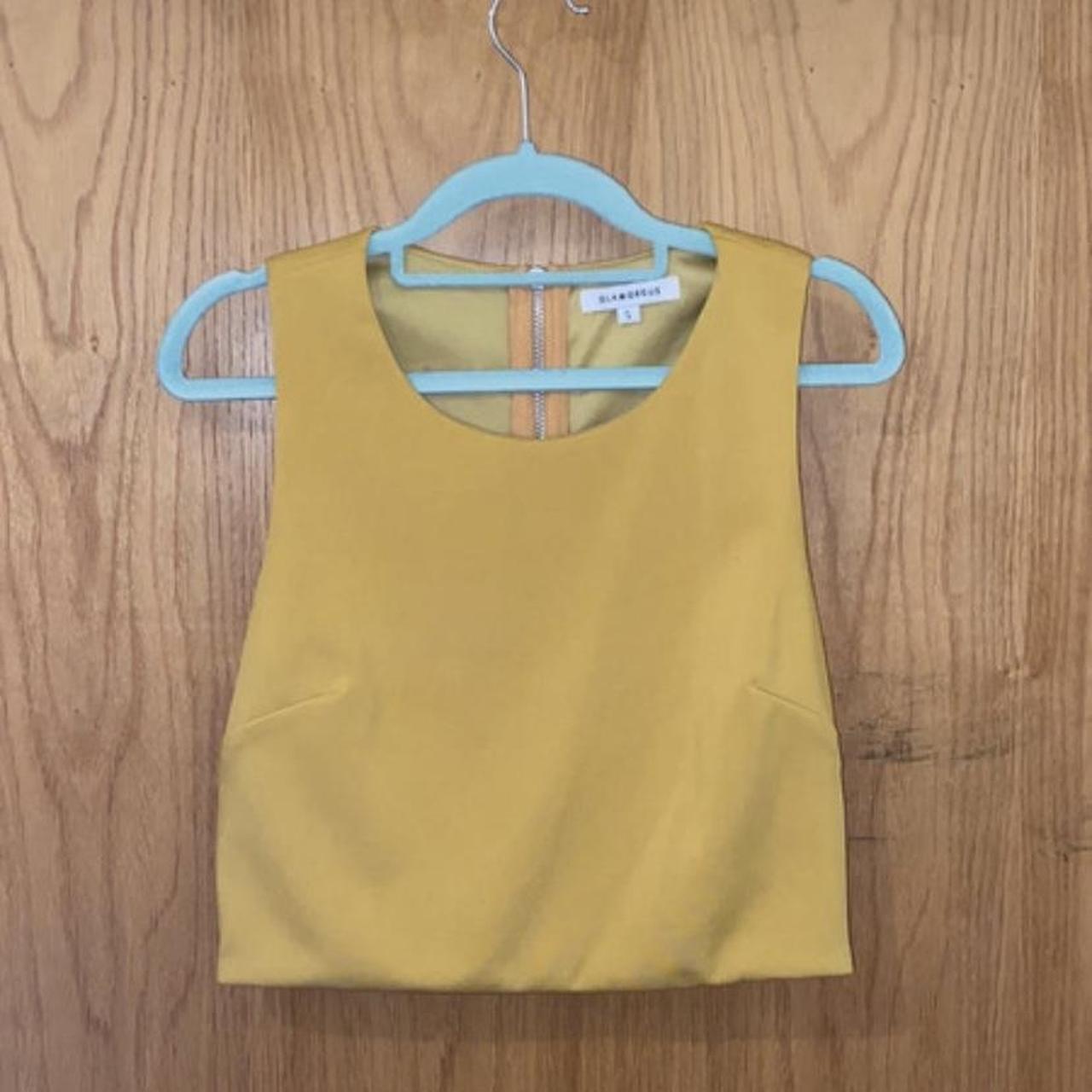 Mustard yellow racer back crop top. Only worn once,... Depop