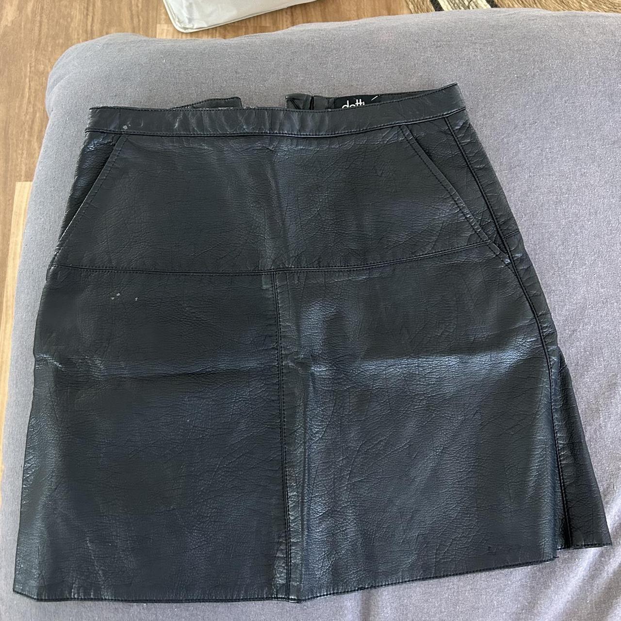super cute leather black dotti skirt. size 8, in... Depop