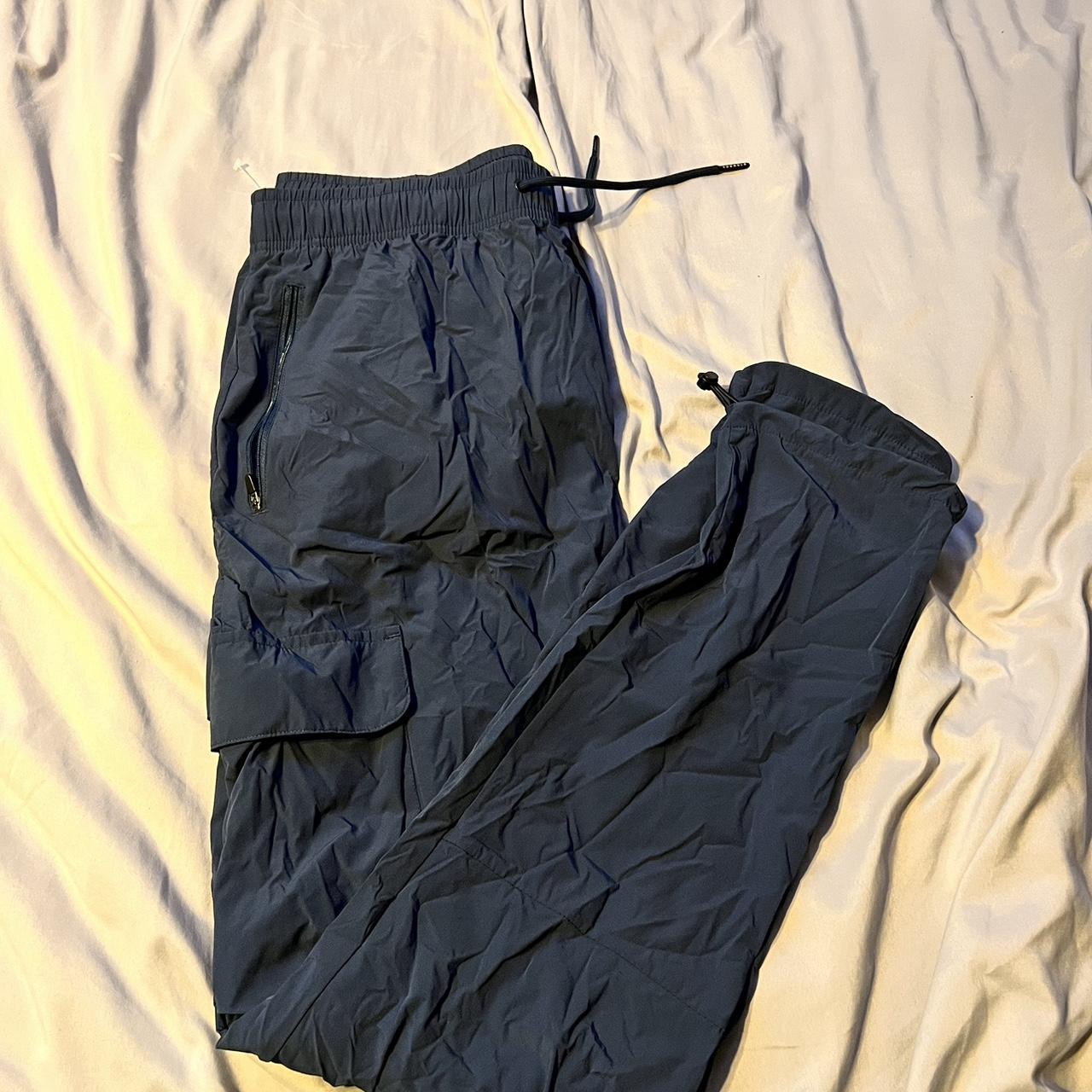 young LA navy blue cargo pants! slim fit to it, size... - Depop