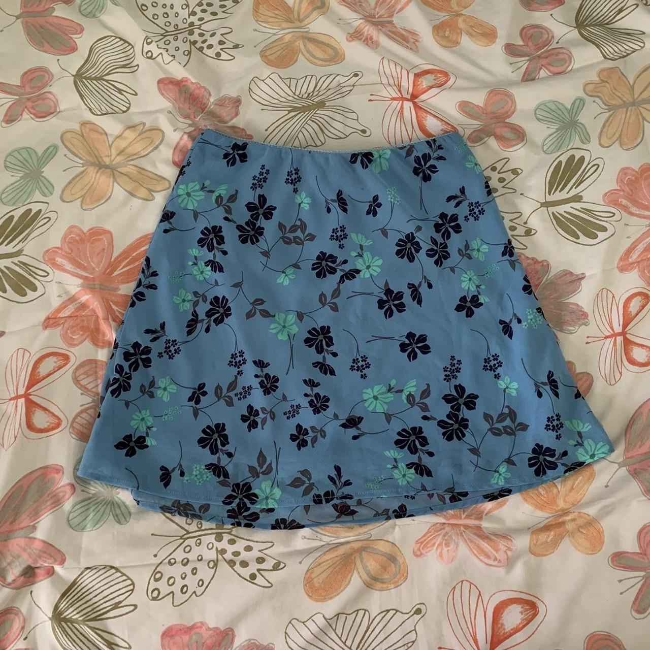 Y2k styled beachy blue floral mini skirt from wild... - Depop