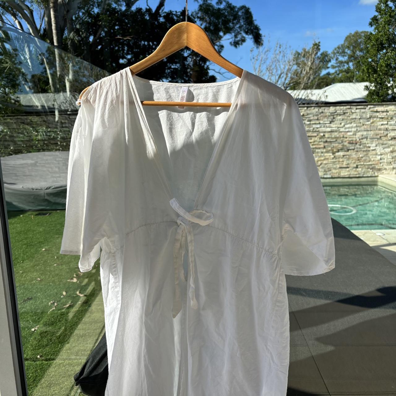 tie up cute beach cover up that fits a small and... Depop