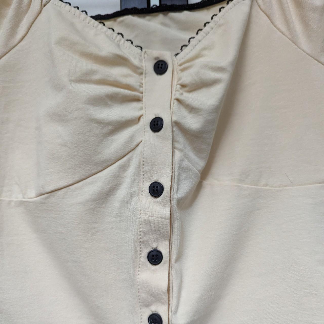 Cream puff shoulder crop top with adorable trim.... - Depop