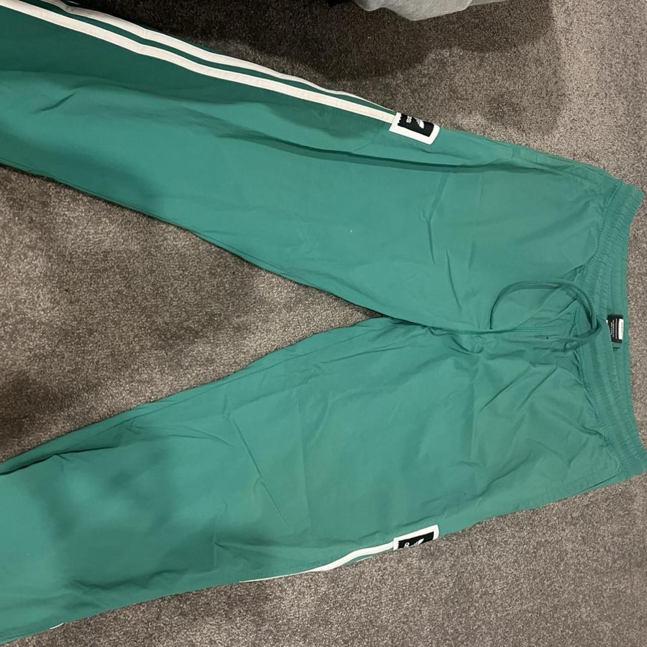 Green adidas tracksuit track pants. Men’s size L.... - Depop