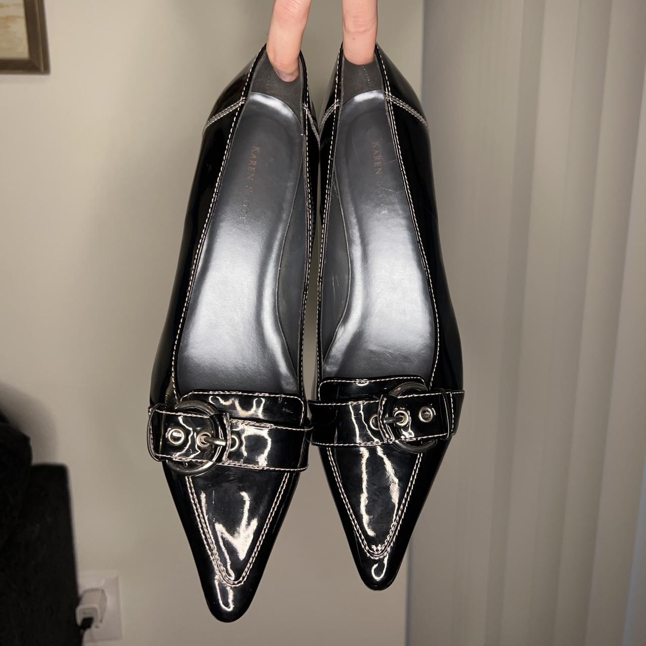 Black pointed toe kitten heels. With a silver buckle... - Depop
