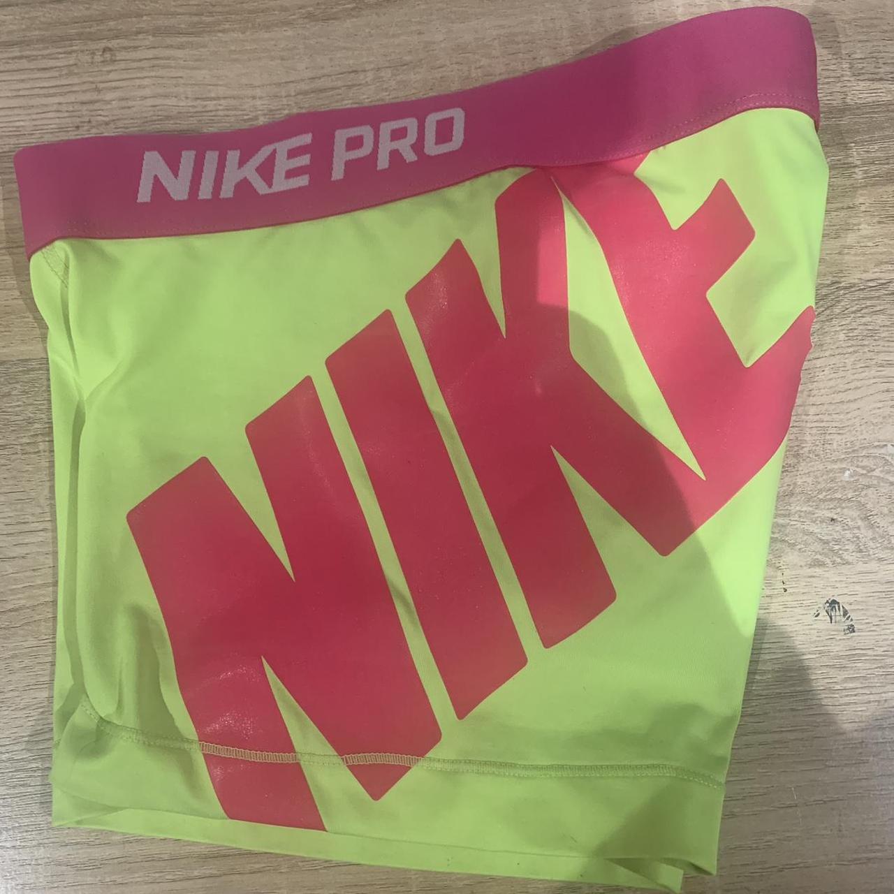 Nike pros xs, Yellow and pink , Condition as shown in...