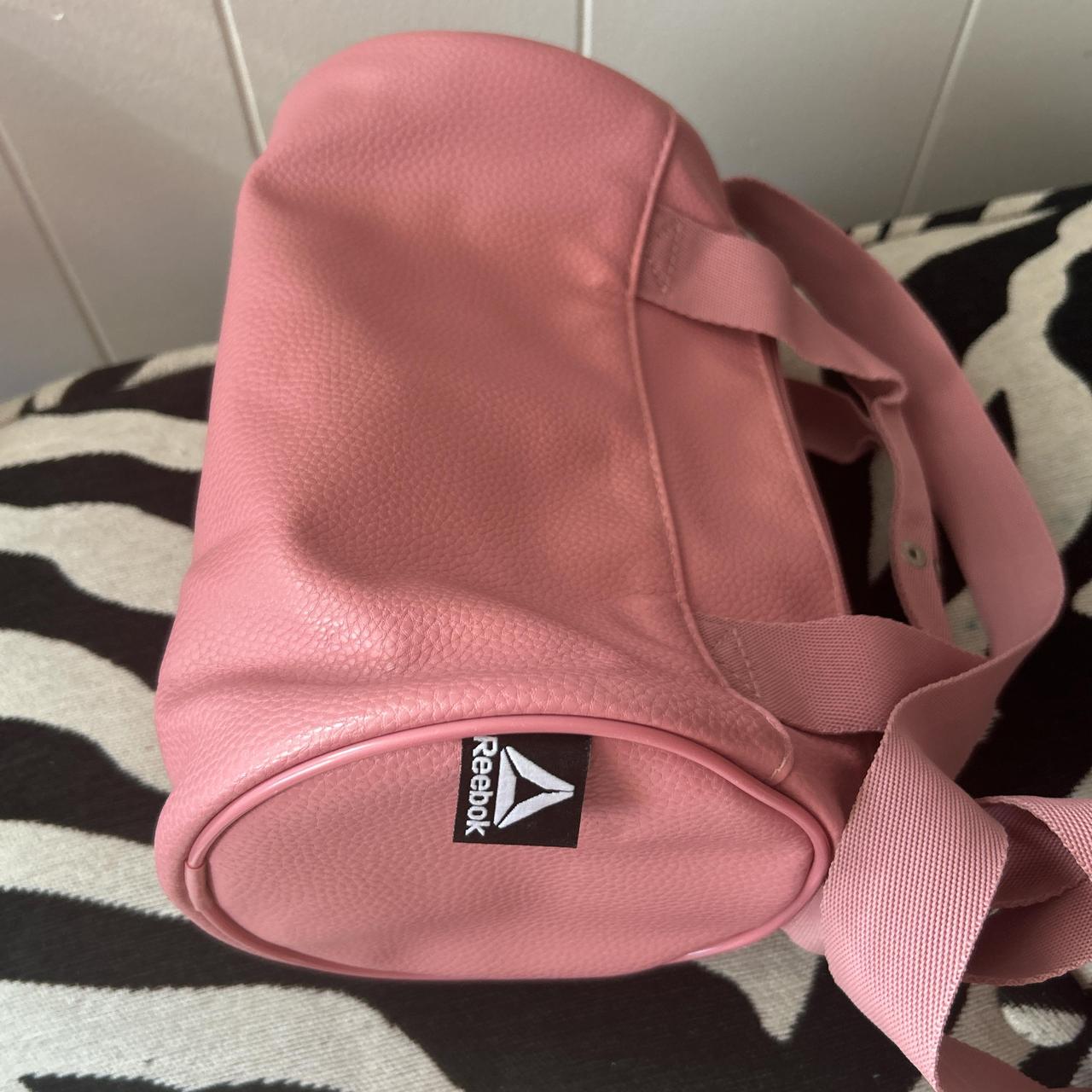 Reebok mini pink gym bag with zipper and inside. Depop