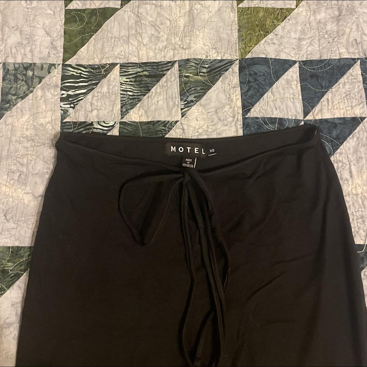 Motel black flare pants with front tie. Size xs Depop