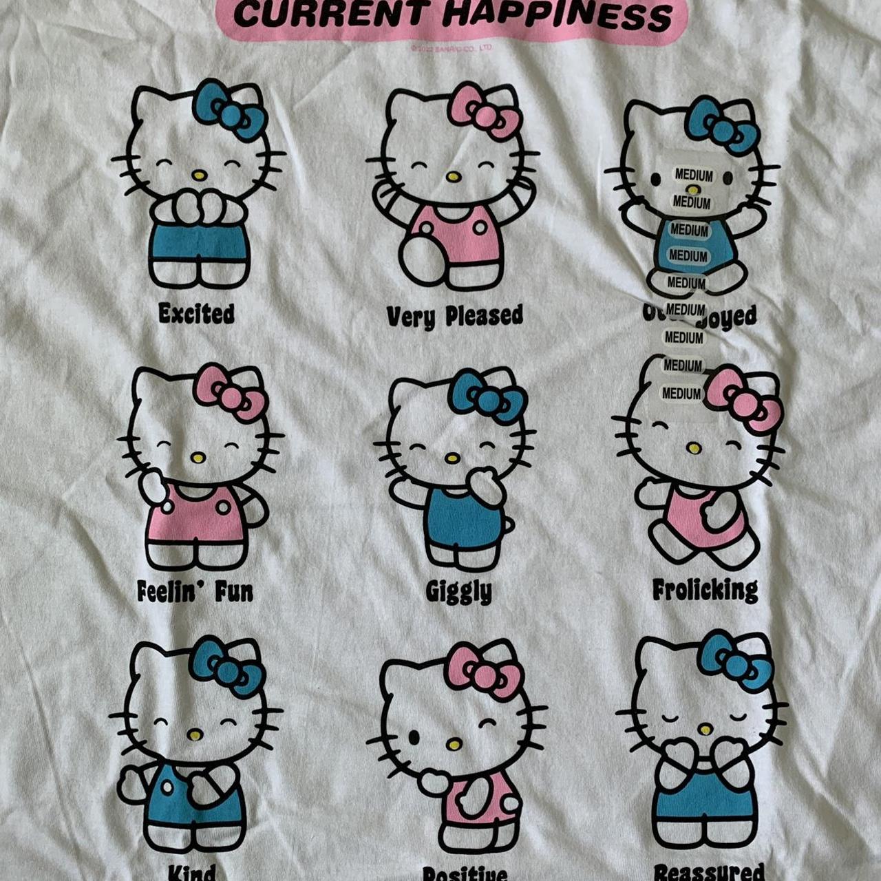 white Hello Kitty design t-shirt with four tiny - Depop