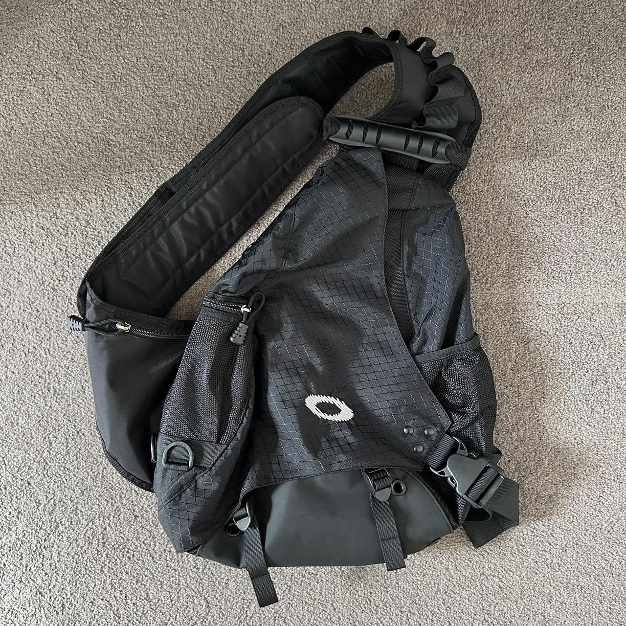 Oakley sling bag. Extremely versatile and durable.... - Depop