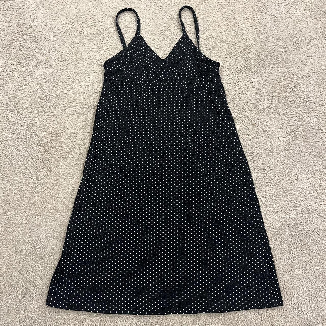 Brandy Melville black & white polka dotted mini... Depop