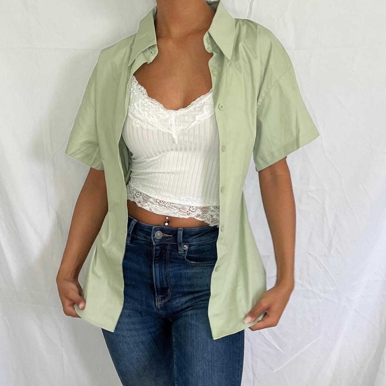 Pastel green button up collared There are snaps on... Depop