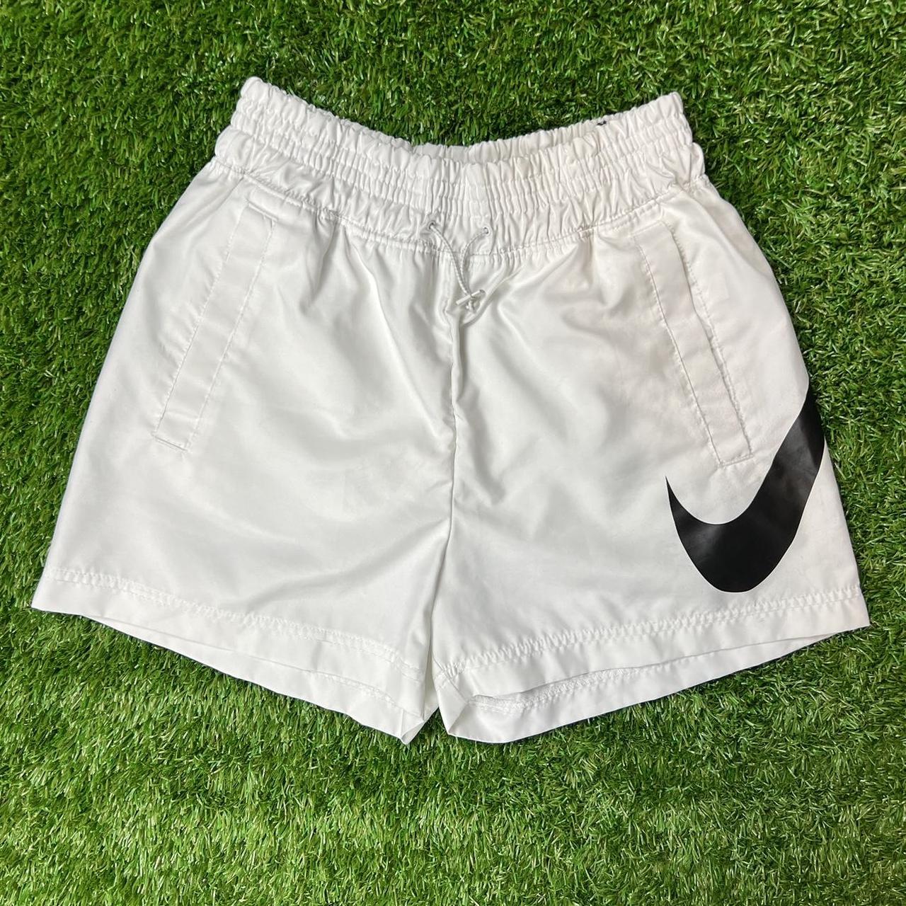 White Nike Shorts Has wrap around swoosh logo and... Depop