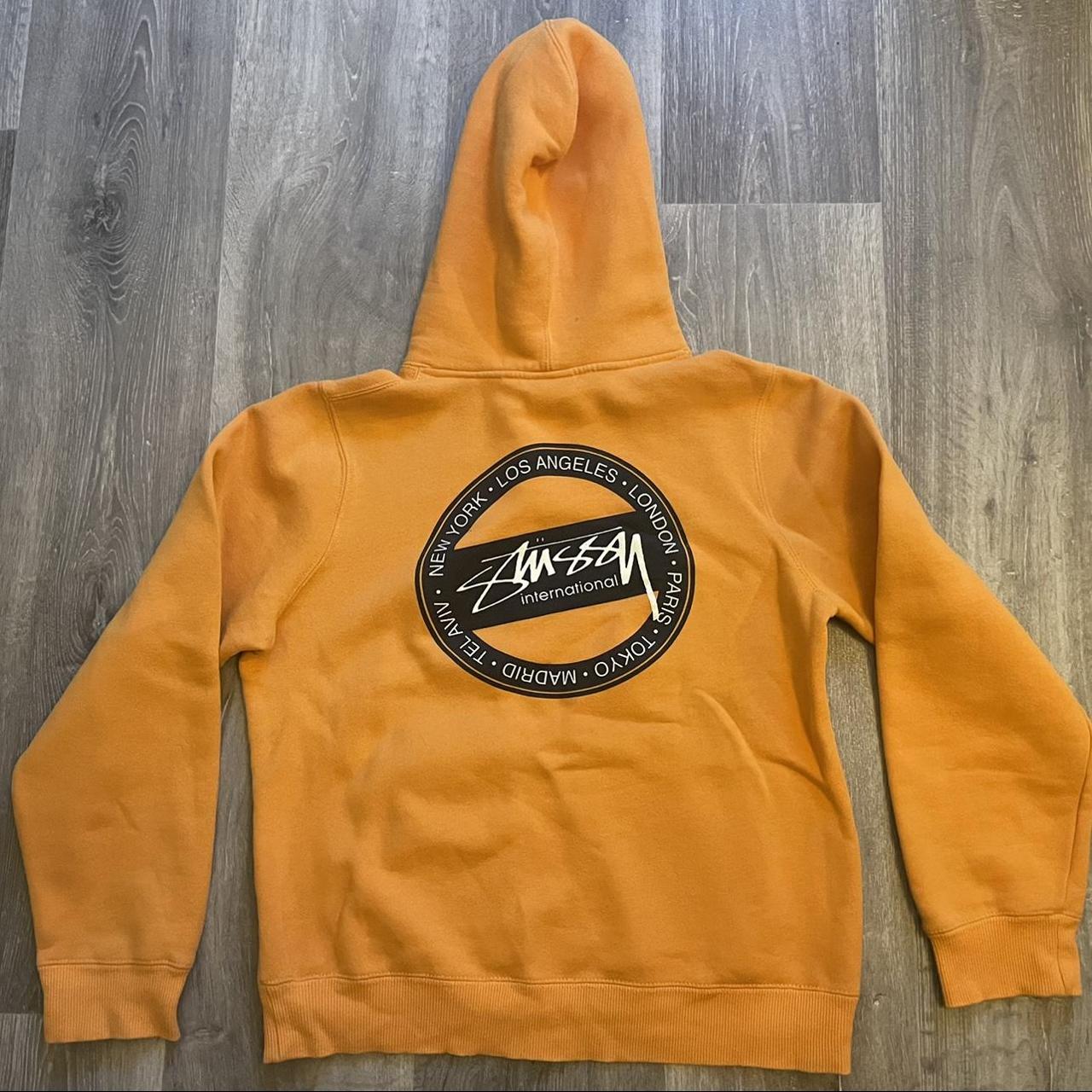 Orange Stussy Hoodie. Size M. Slight hole starting... - Depop