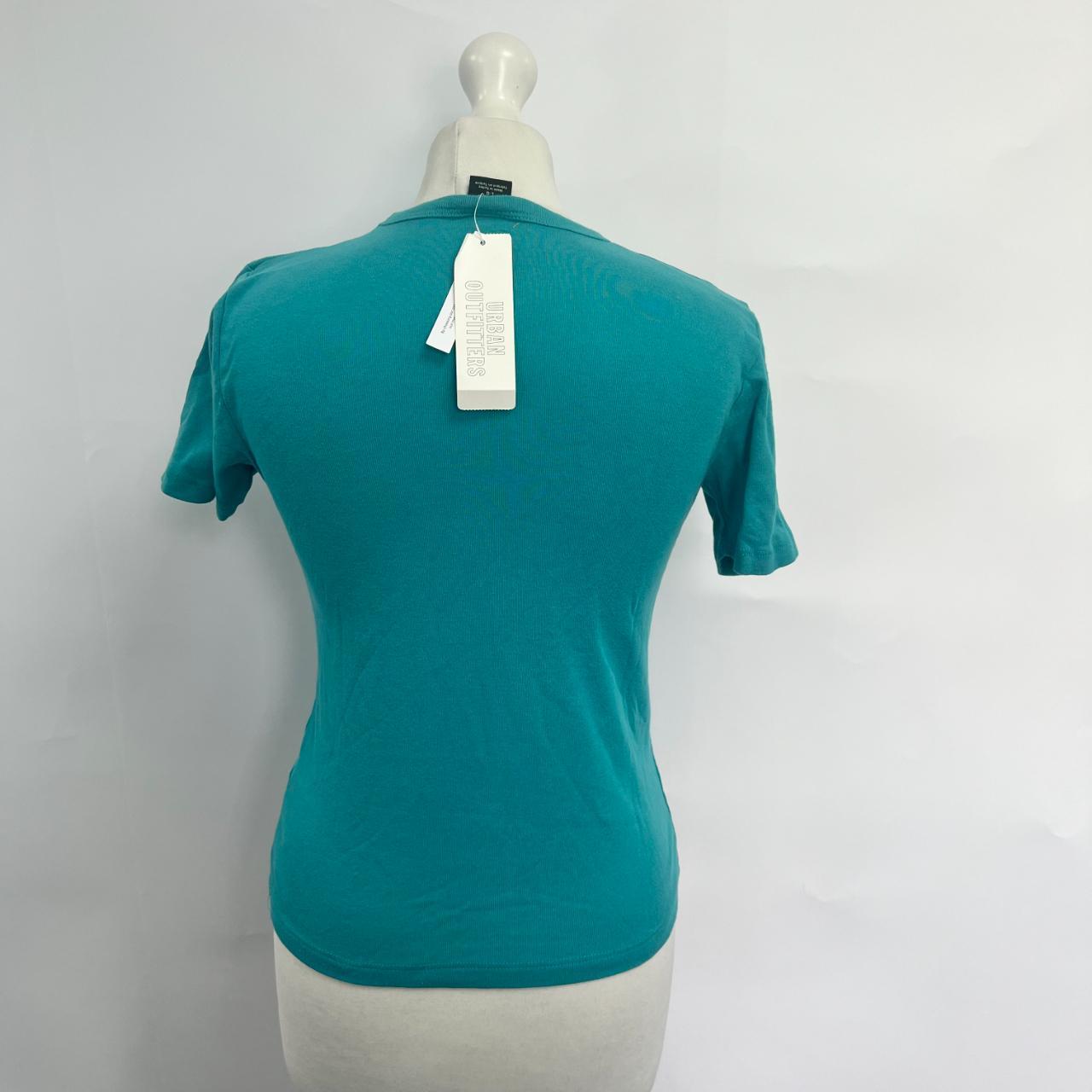 Urban Outfitters Stay Groovy Baby Tee. Blue.... Depop