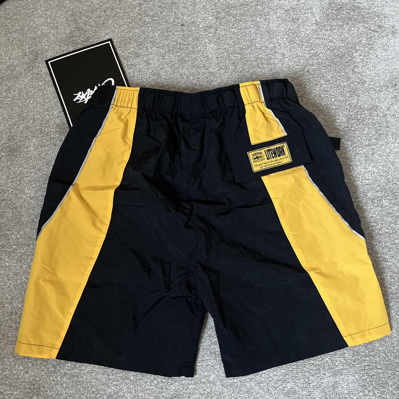 Corteiz Men's Black and Yellow Shorts | Depop