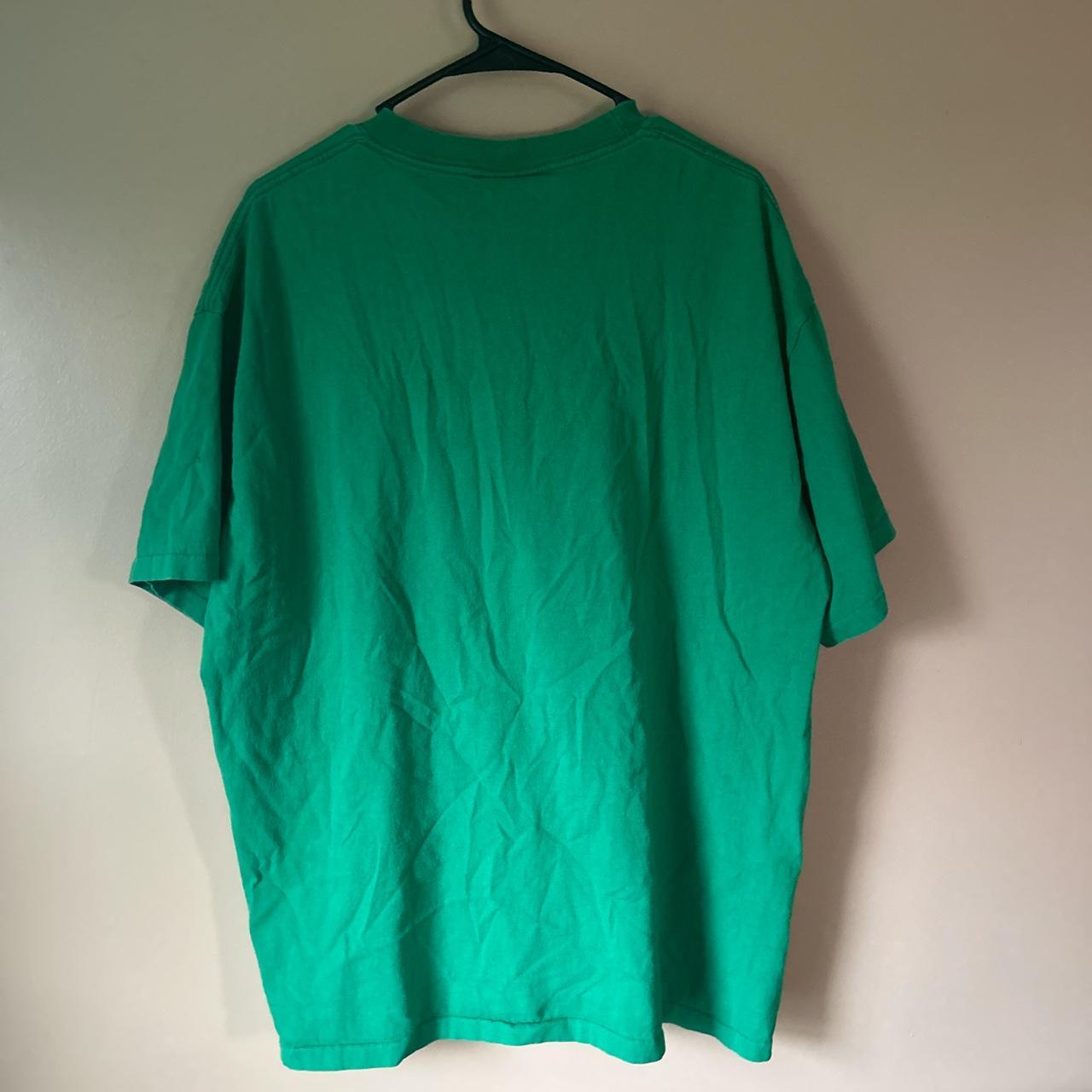 Nutmeg Men's Green T-shirt | Depop