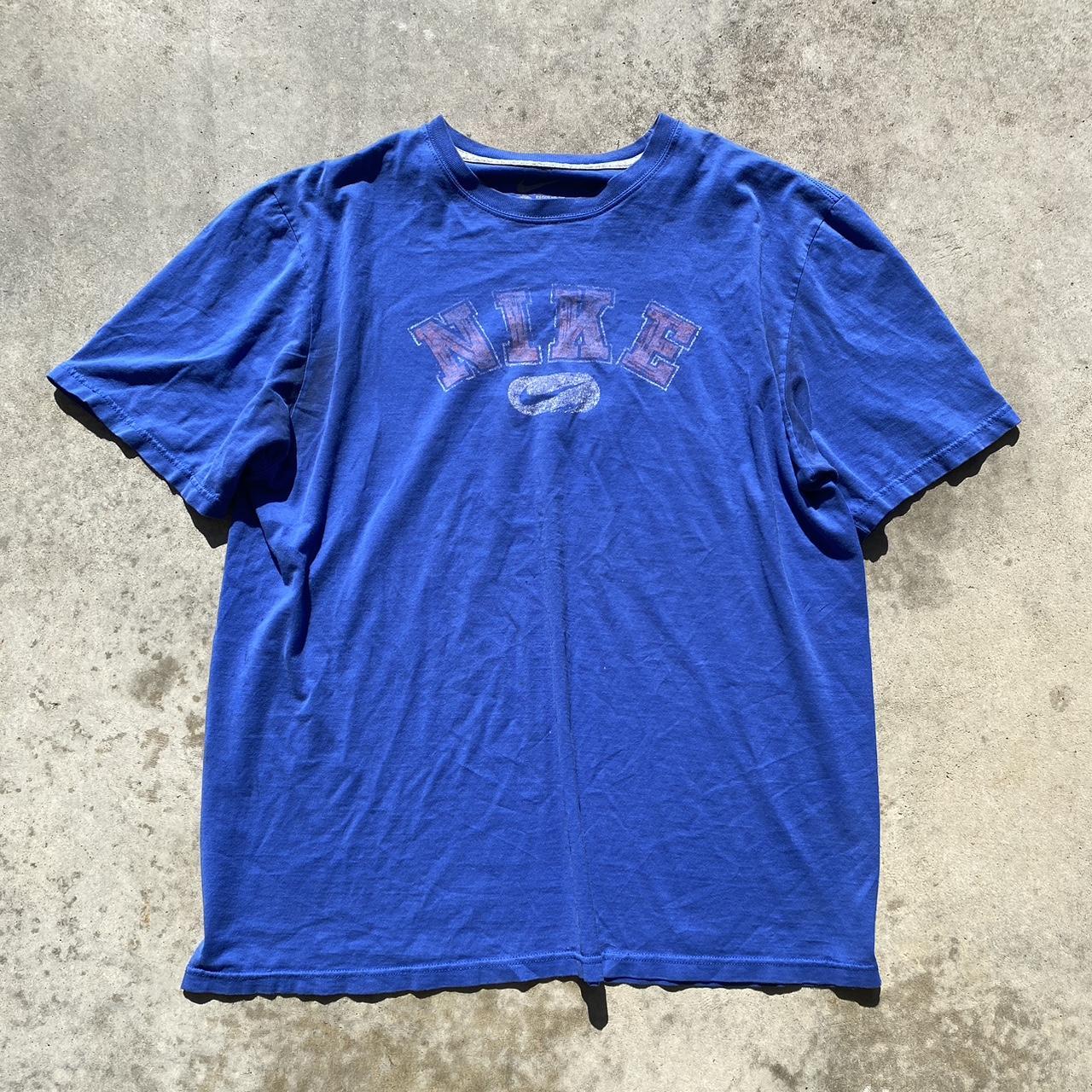 Y2K blue Nike spell out tee size L Pit stains as... - Depop