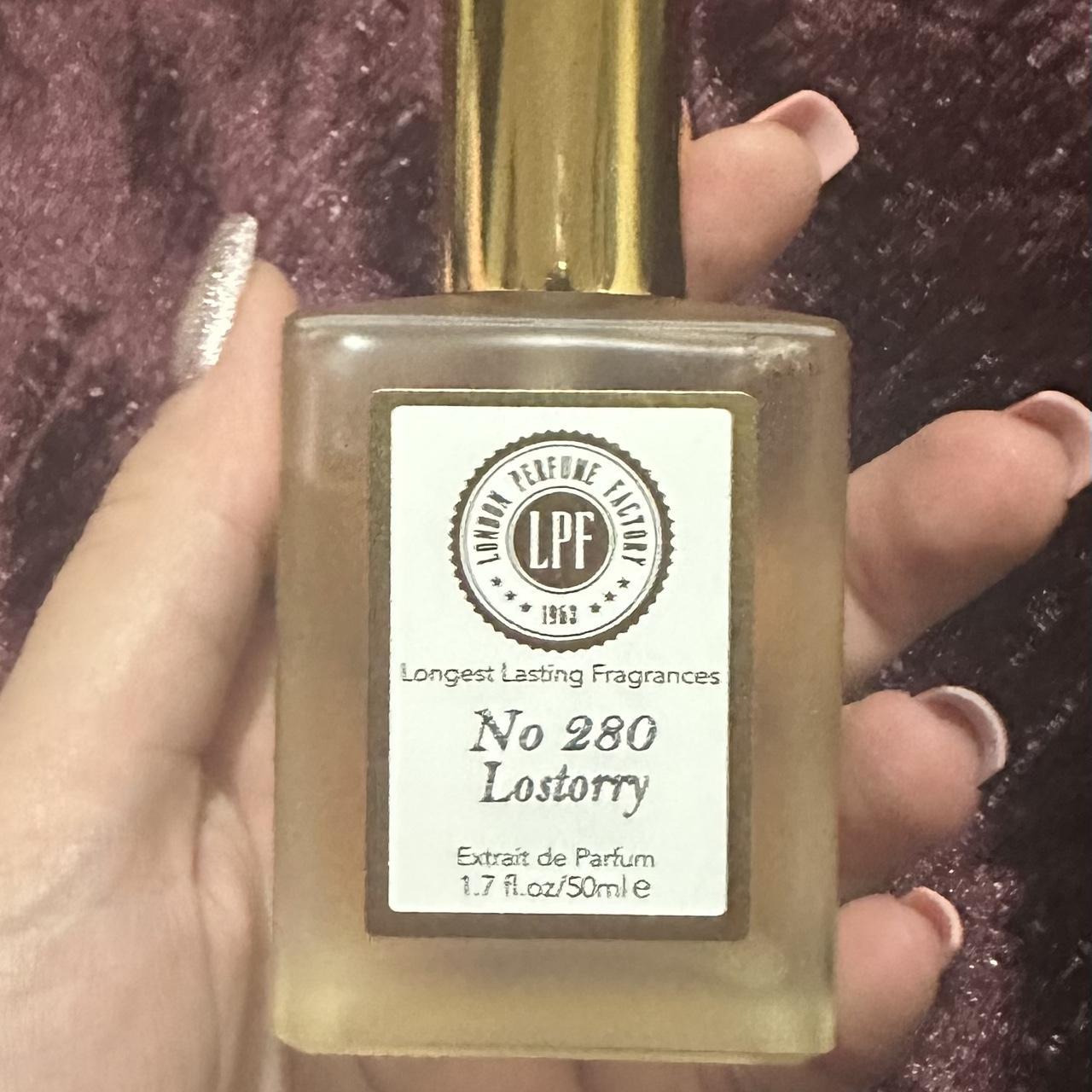 Lostorry perfume, smells like tom ford cherry, very... Depop