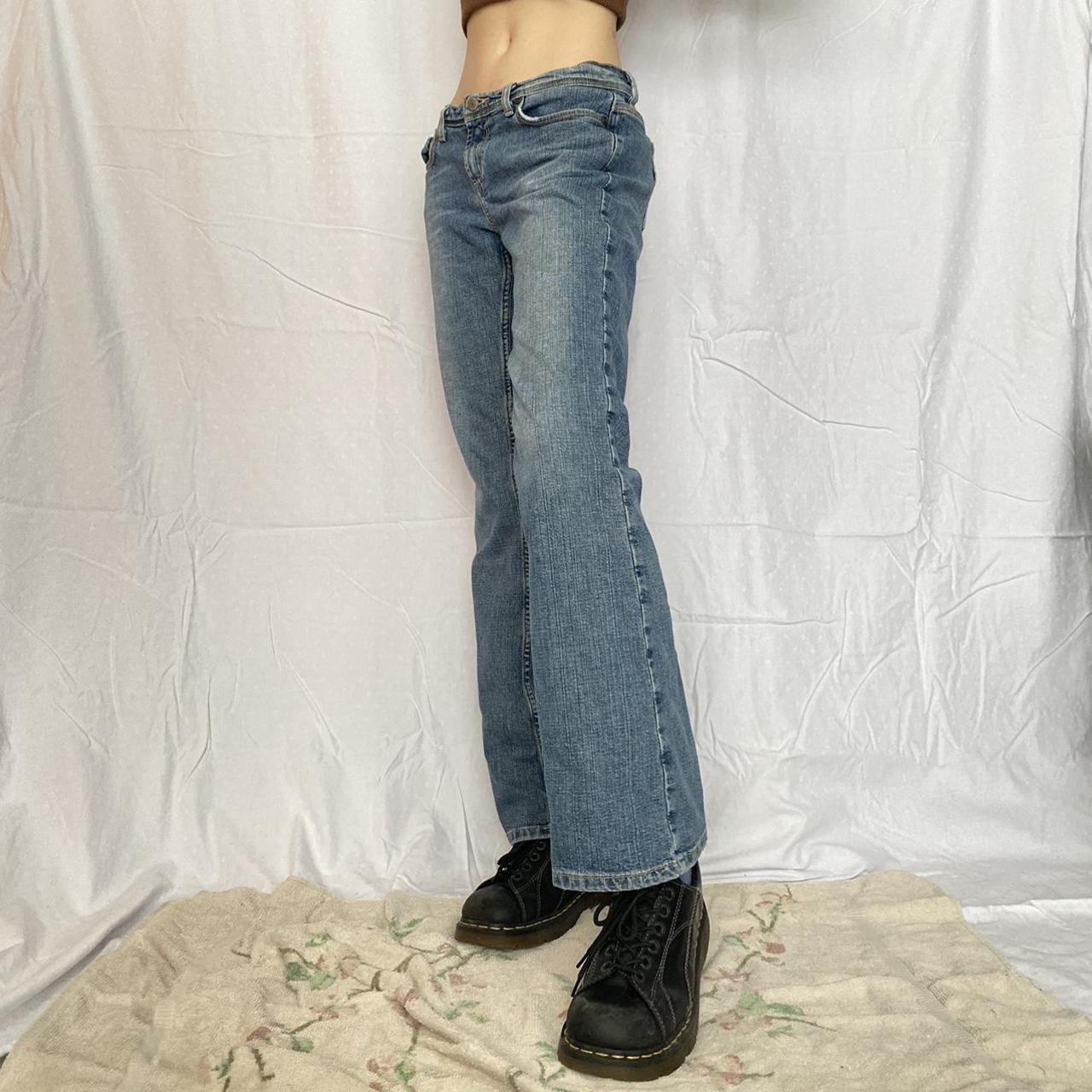 Vintage cyber y2k bootcut baggy low waisted jeans by... - Depop